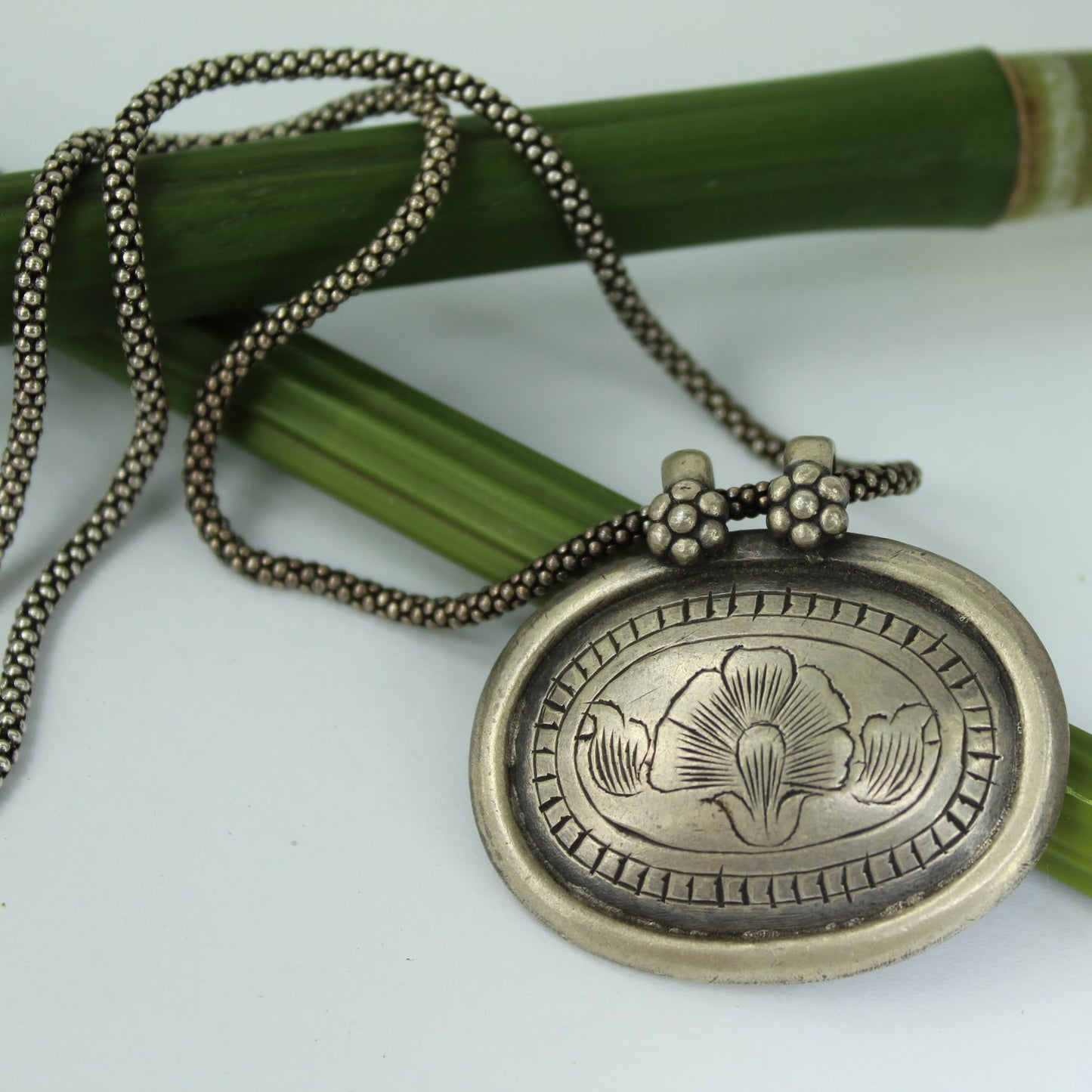 Tribal Necklace Silver Refined Etched Floral Double Bail Silver Decorative Chain closeup necklace chain