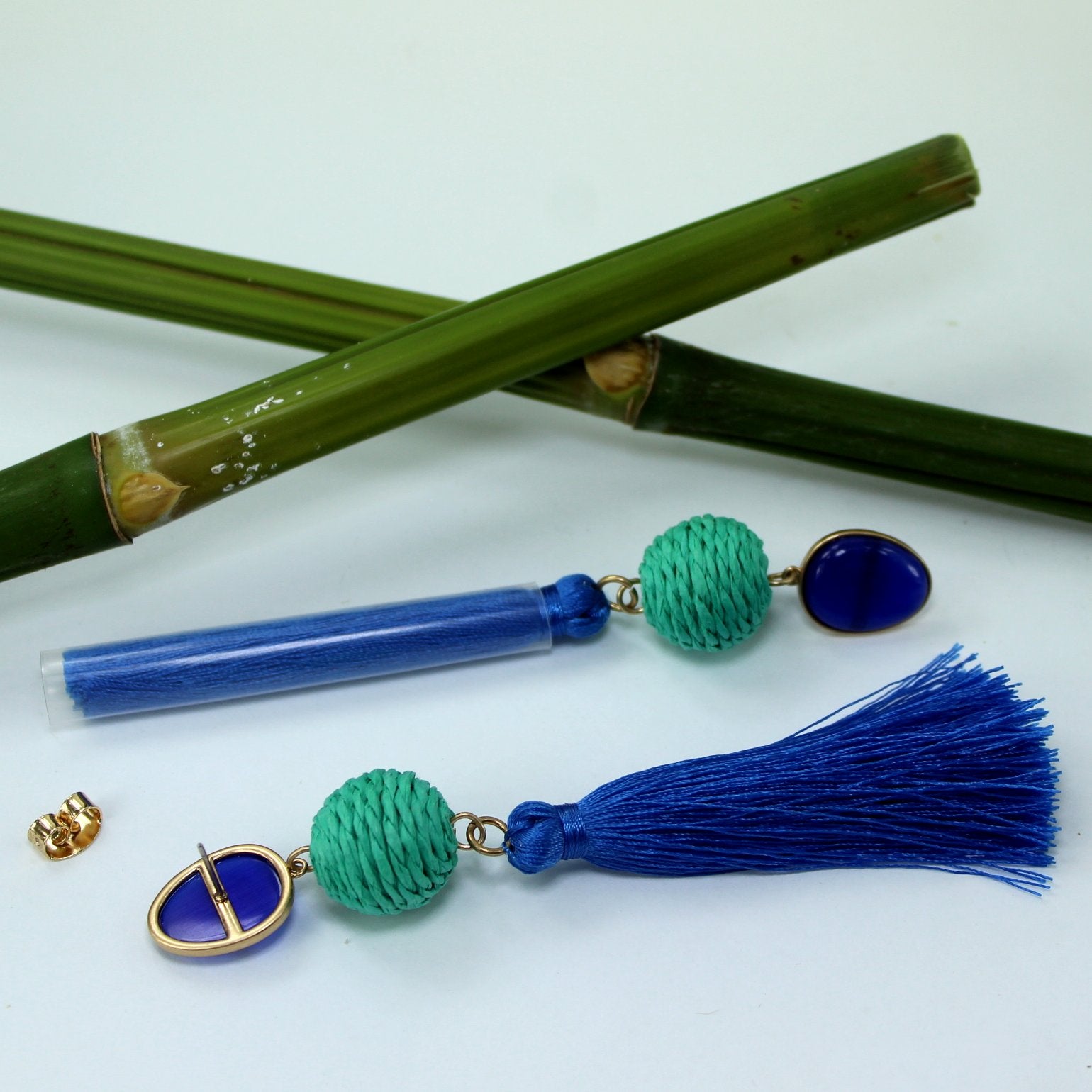 Anthropologie NWT Long Tassel Glass Bead Earrings 4 1/2" Lapis Blue Aqua closeup view of earrings