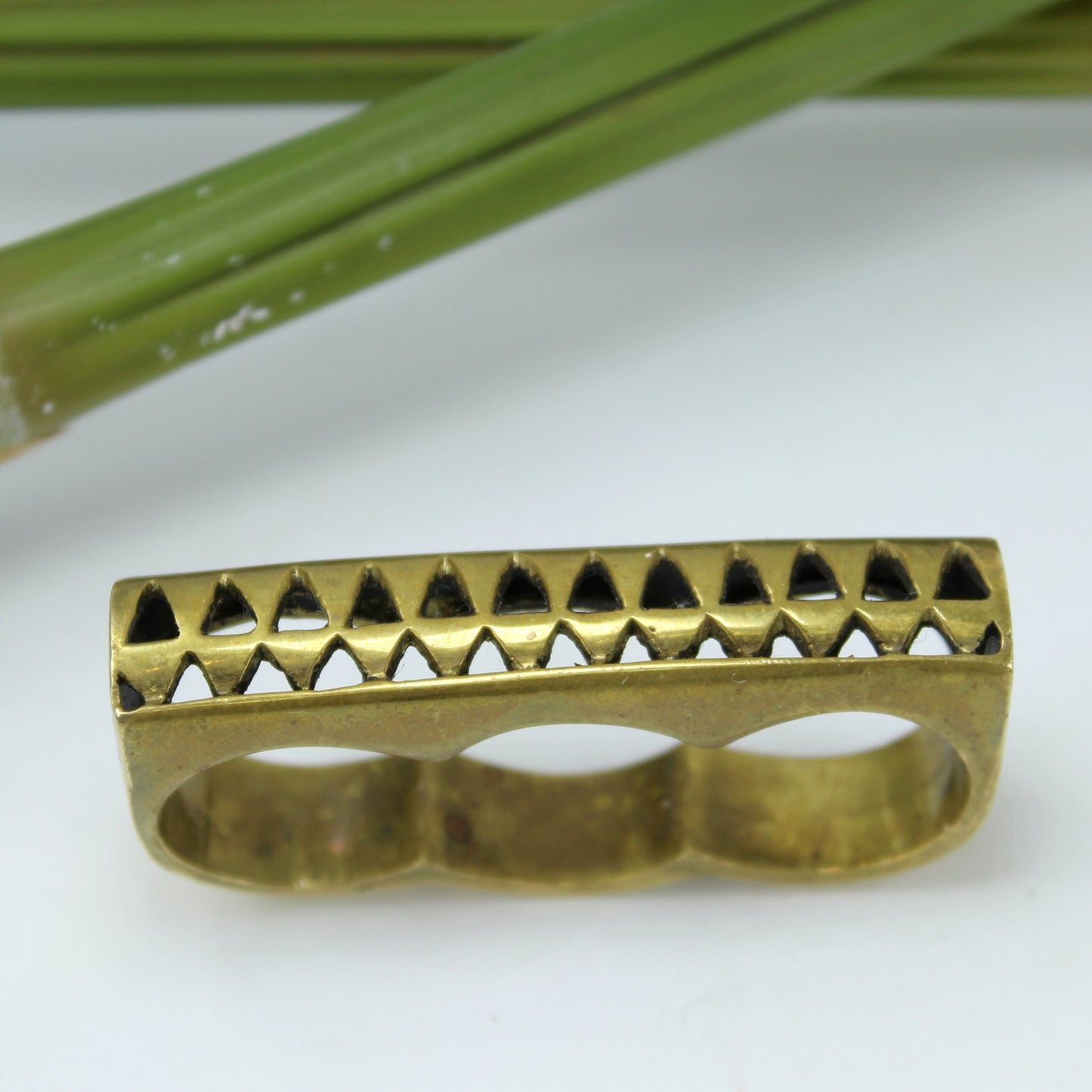 Eleven44 Brass 3 Finger Ring Repeat Open Triangle Pattern