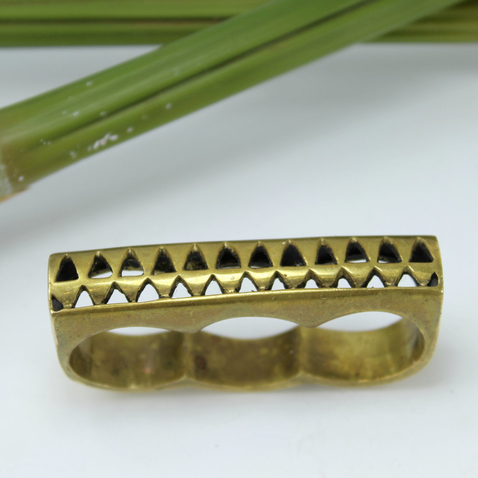 Eleven44 Brass 3 Finger Ring Repeat Open Triangle Pattern