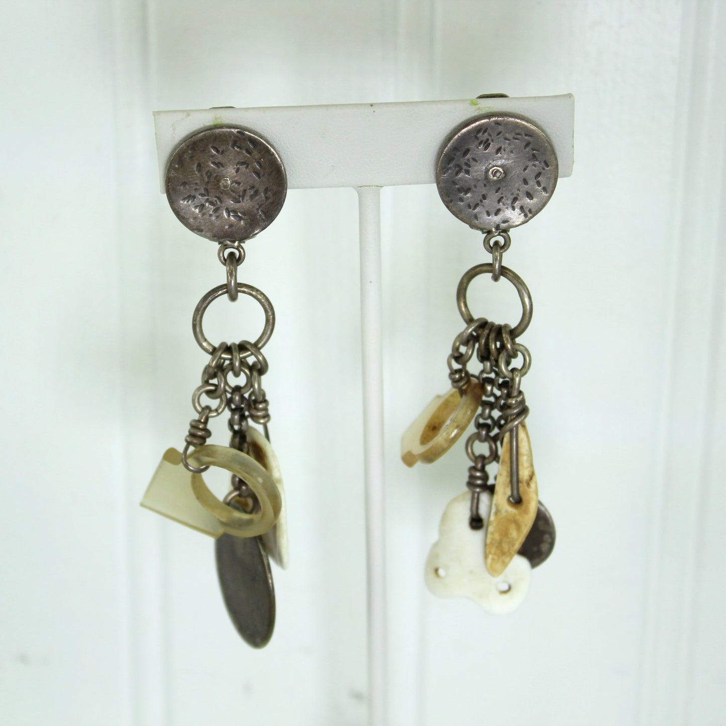 Vintage African Tribal Big Earrings Dangle Metal Shell Bone Coin Charms closeup as on ear