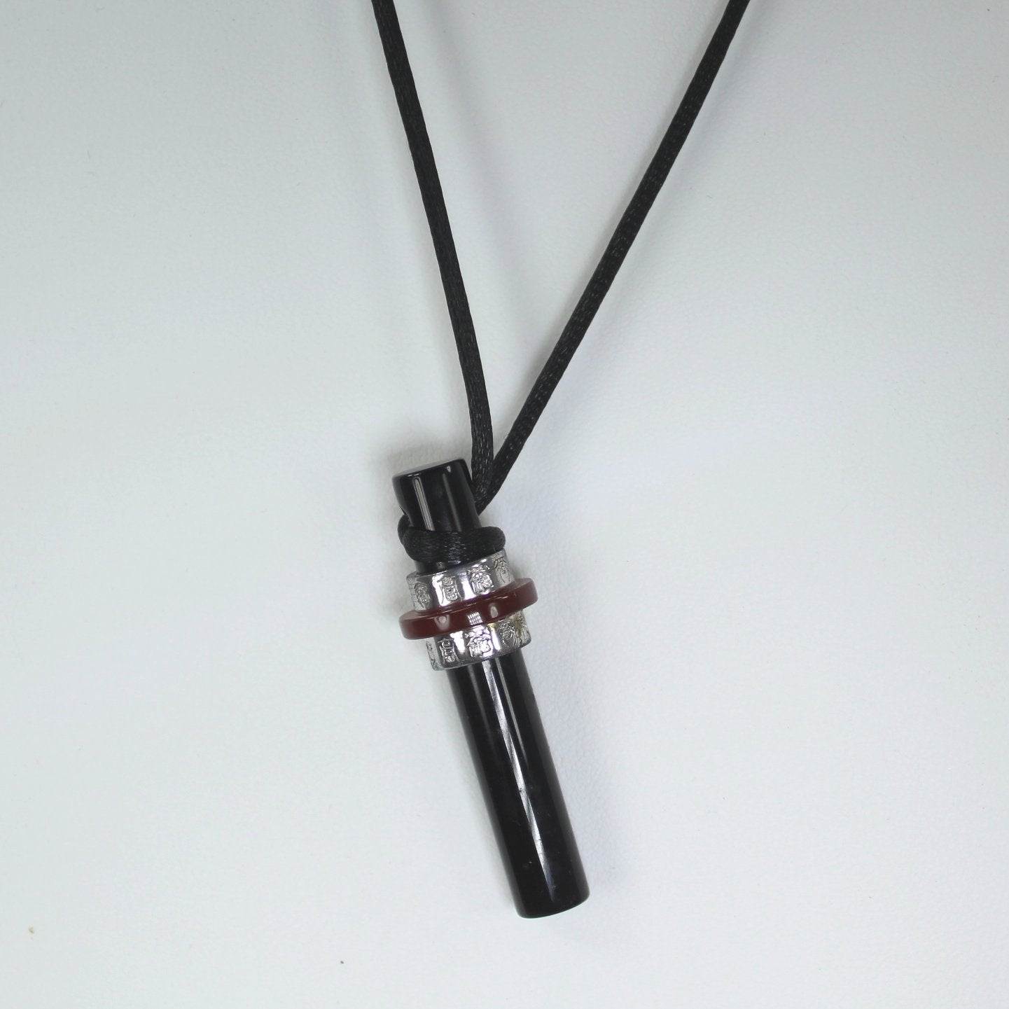 Black Red Glass Necklace Silver Bands Asian Symbols Modernistic closeup view pendant