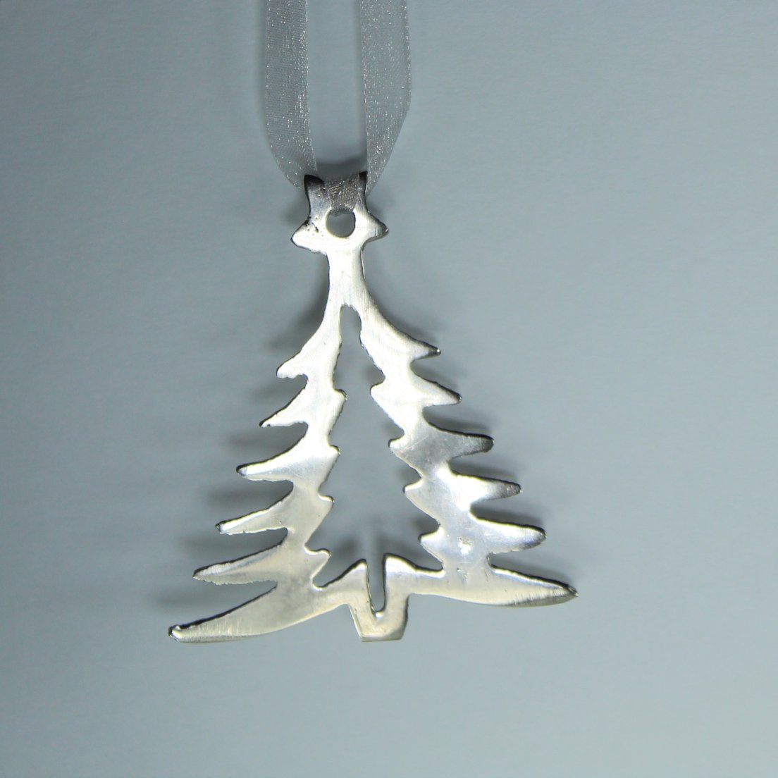 Holiday Christmas Ornament Silver Metal Cutout Tree Hand Made closeup tree