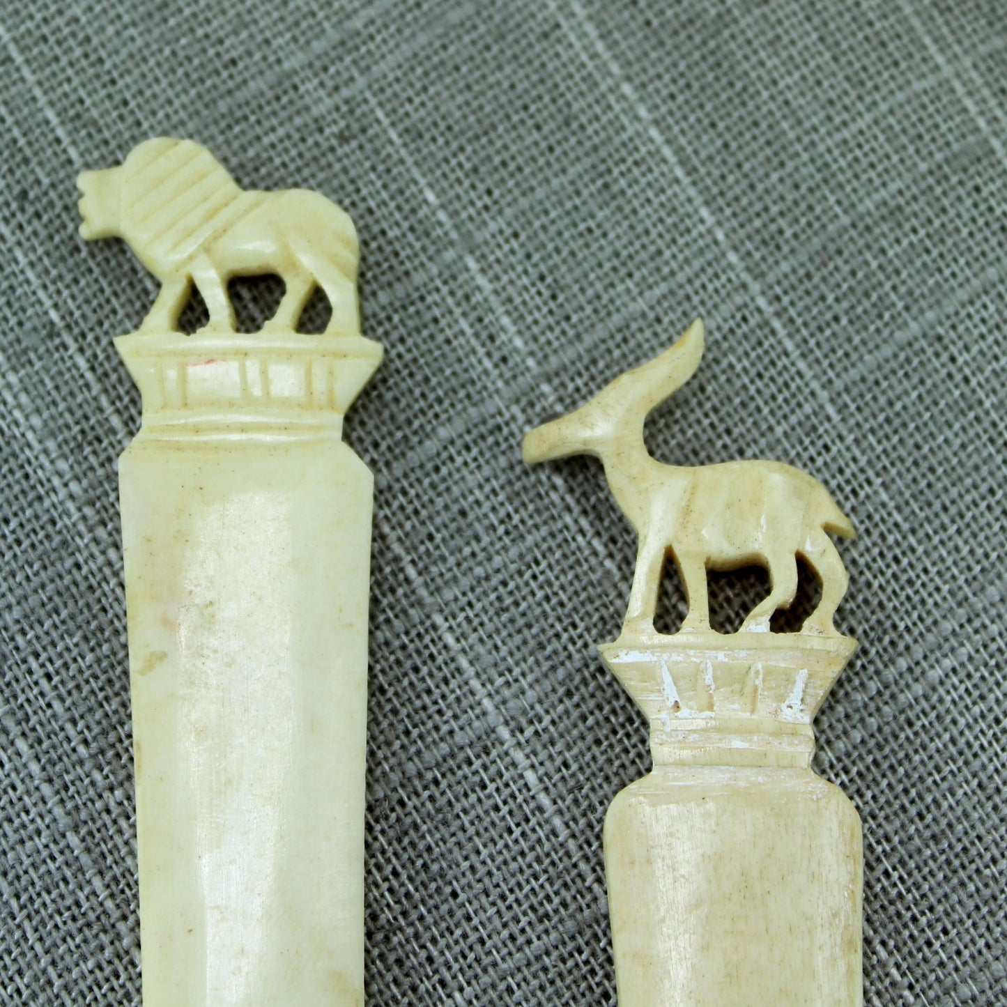 Pair Vintage Bone Bookmarks Letter Opener Lion Gazelle Carved closeup animal carving
