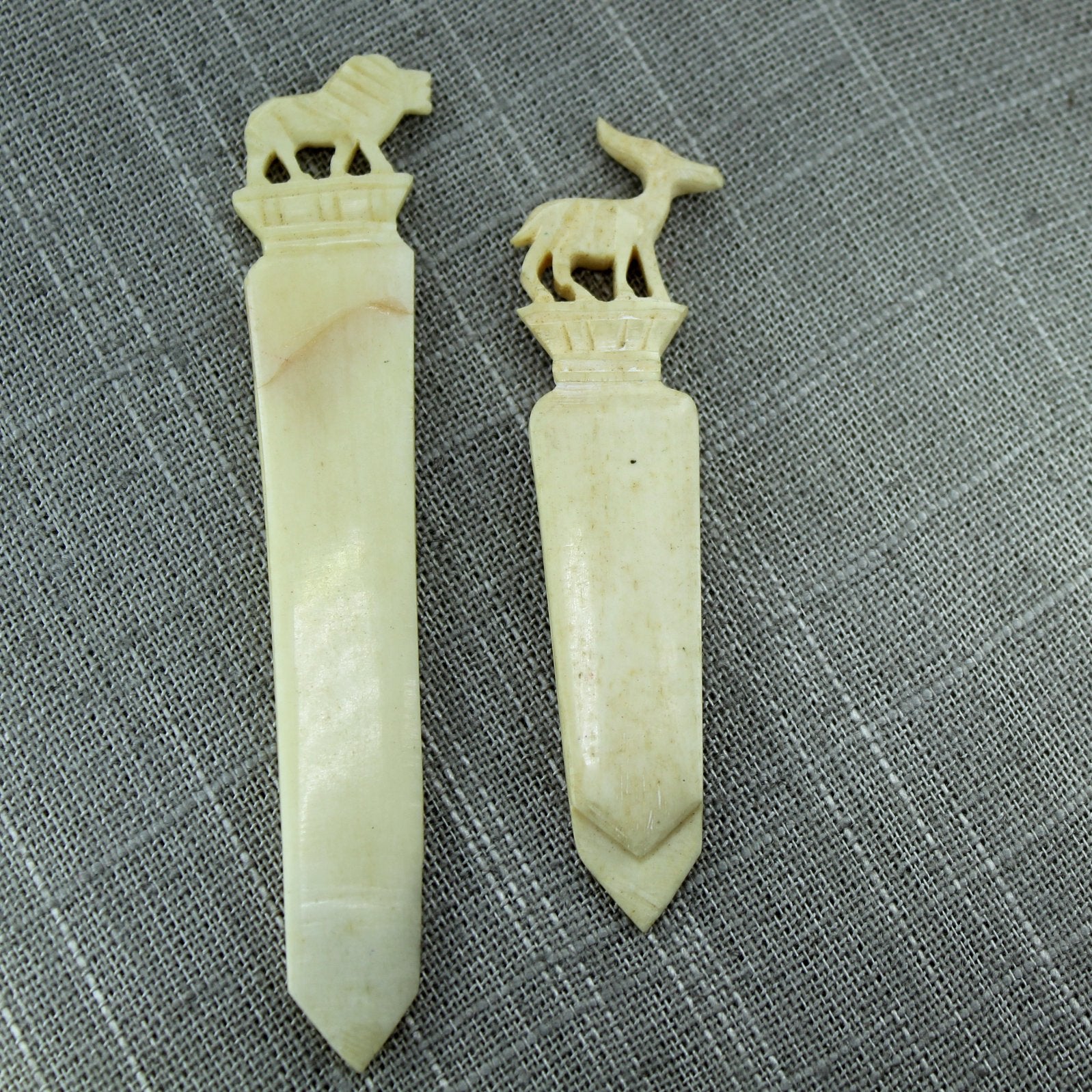Pair Vintage Bone Bookmarks Letter Opener Lion Gazelle Carved back showing crack repair
