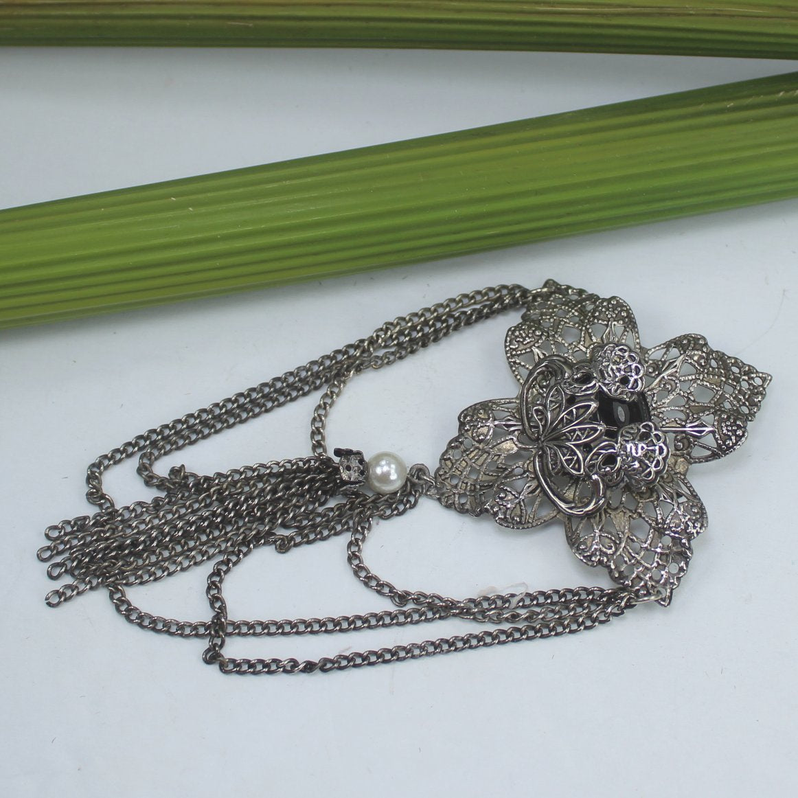 1928 Jewelry Company Filigree Pin Onyx Pearl Chains nice filigree