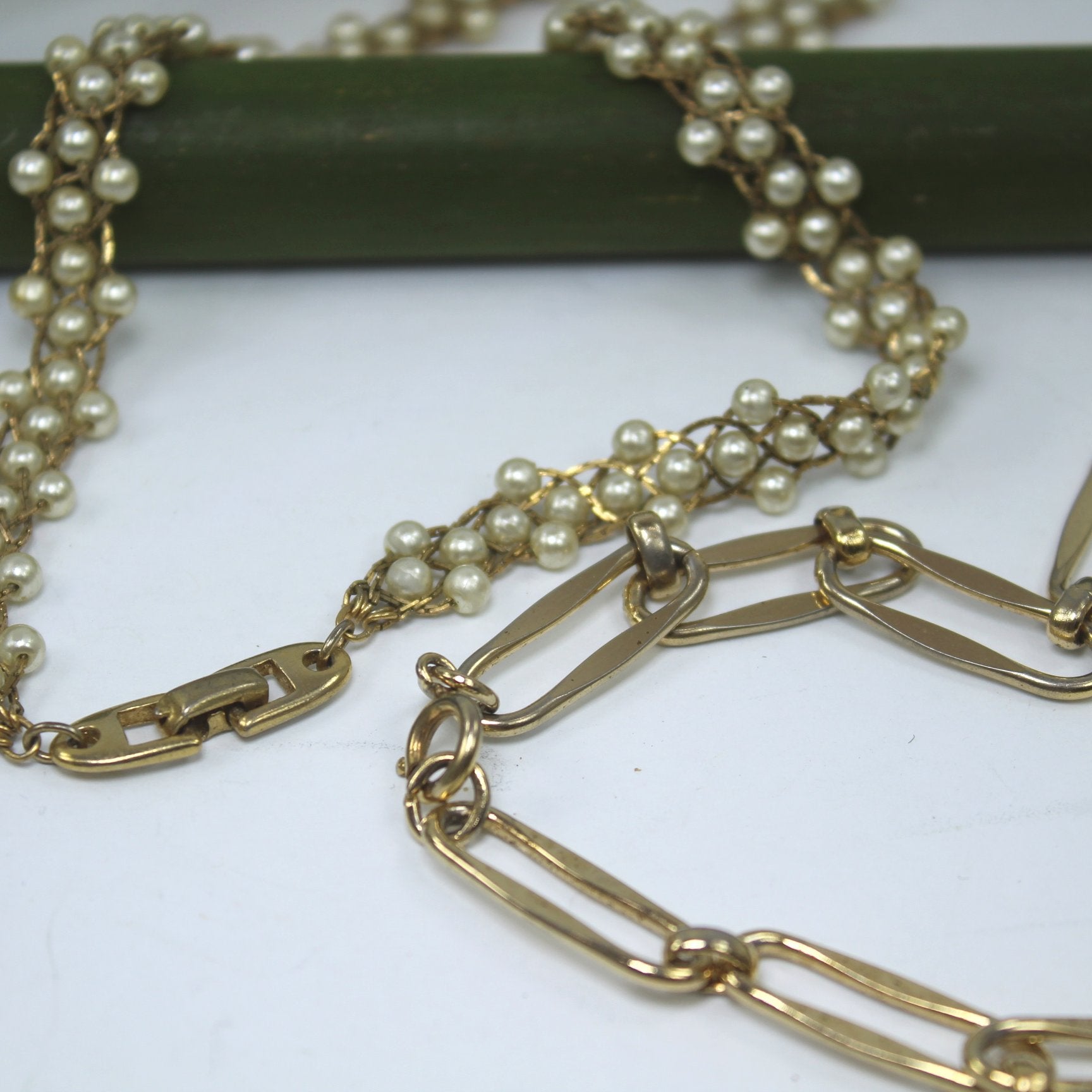 Two Napier Vintage Necklaces 30" Mod Oval Long Links 16" Pearl Gold Chain Woven closeup view chains
