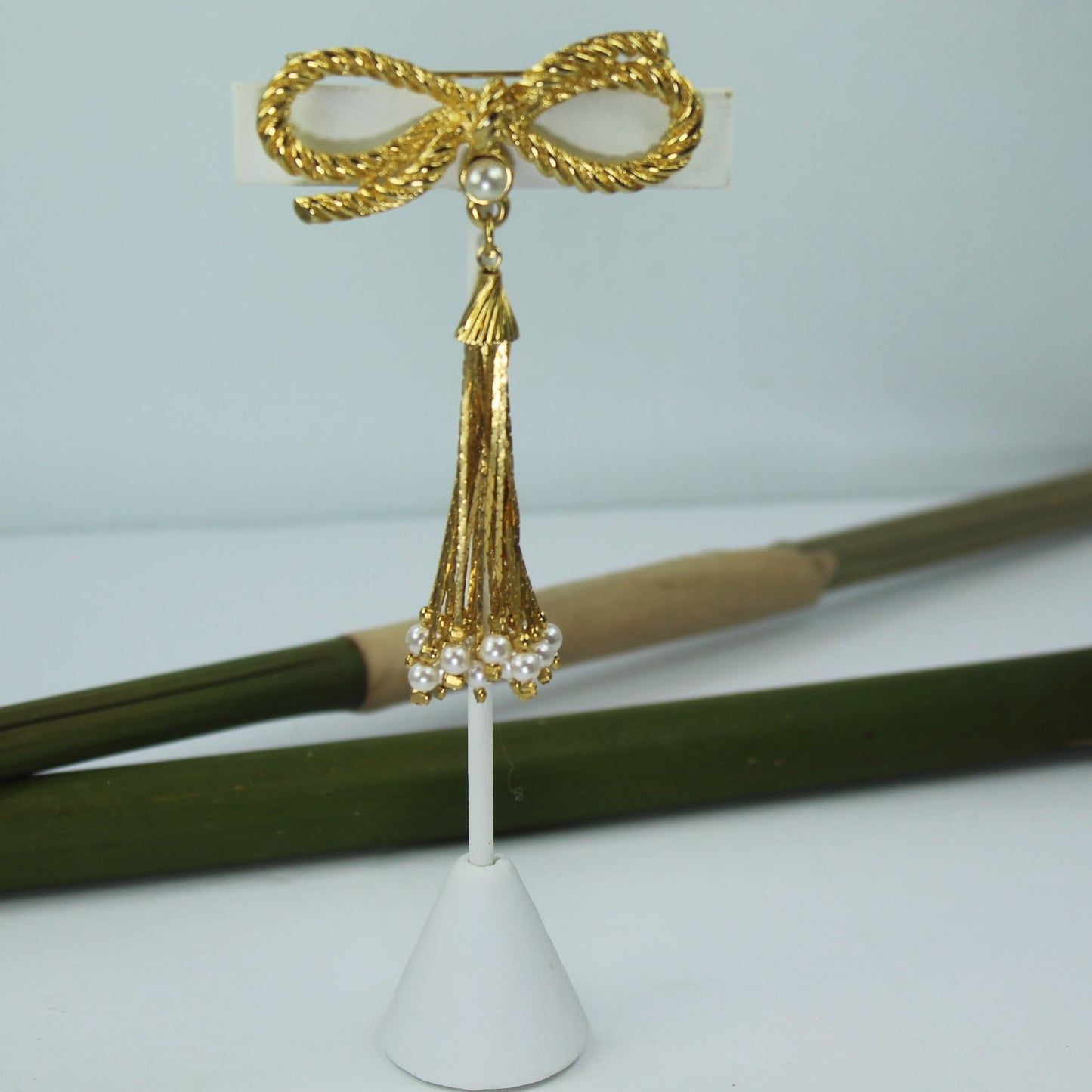 Gold Bow Pin Pearl Long Chain Tassel Designer Quality as pinned view of brooch