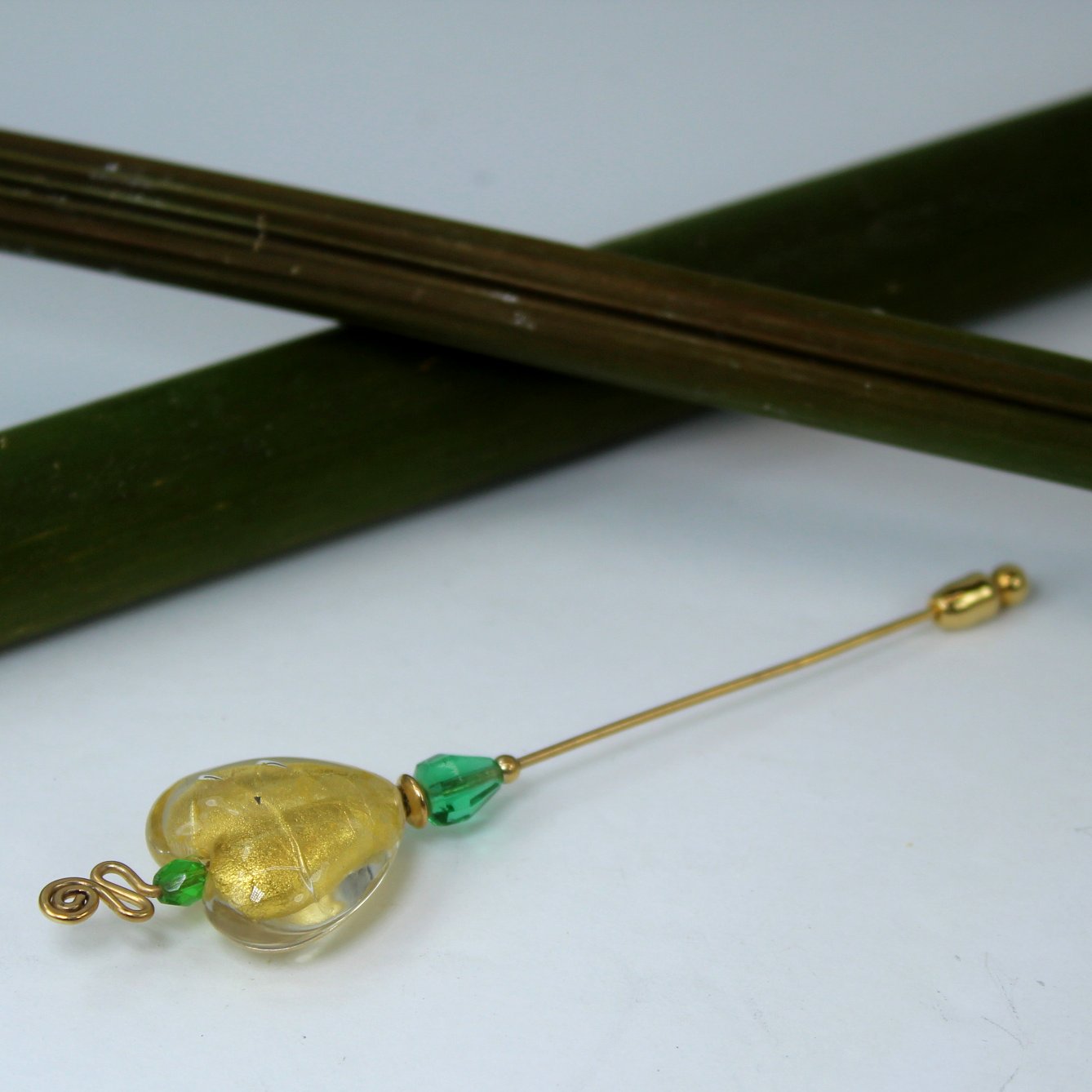 Art Glass Stick Pin Hat Pin Heart Shape Glass Green Beads view of wire decorated bead top