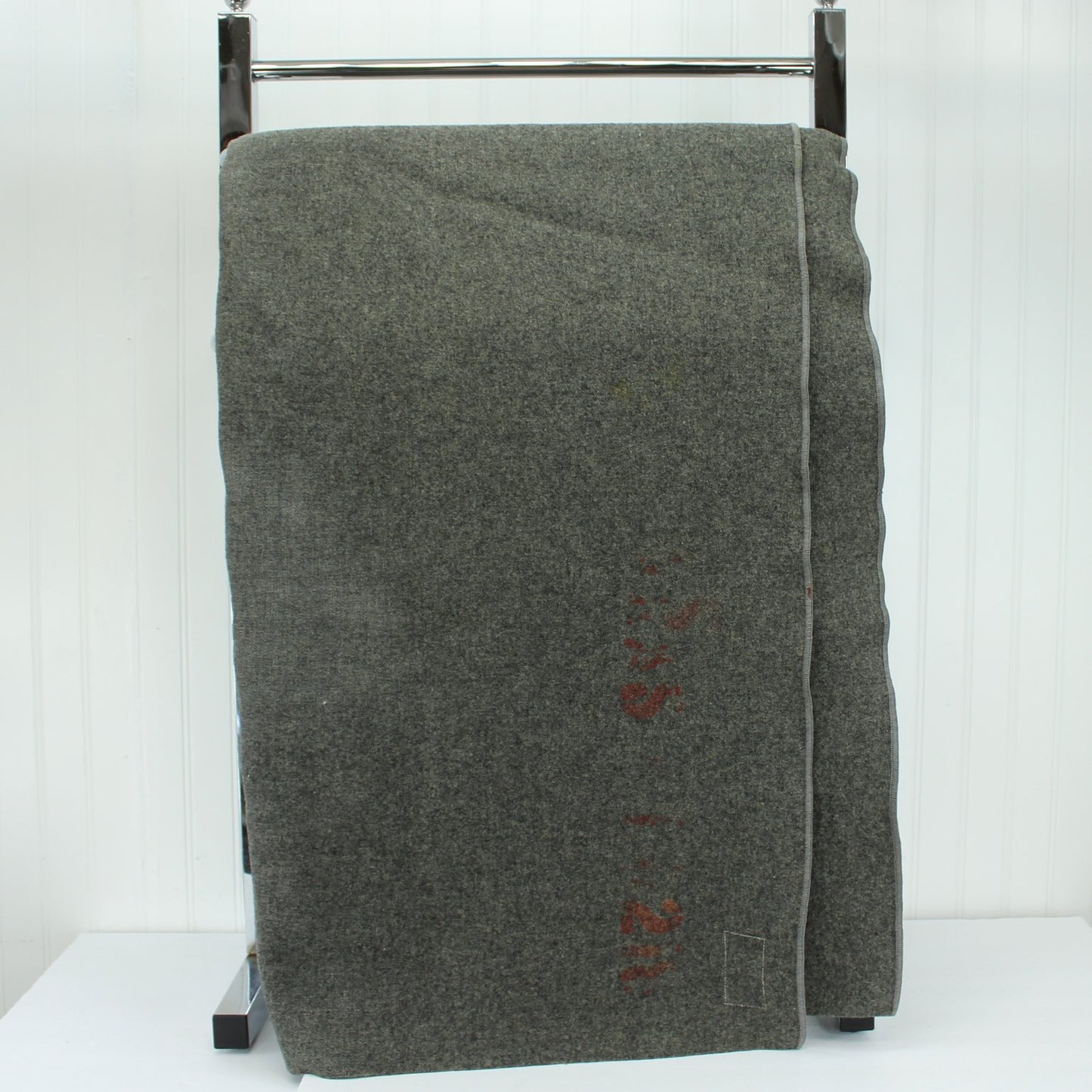 Old Military Style Wool Blanket Partial Imprint Grey Wool Heavy folded view