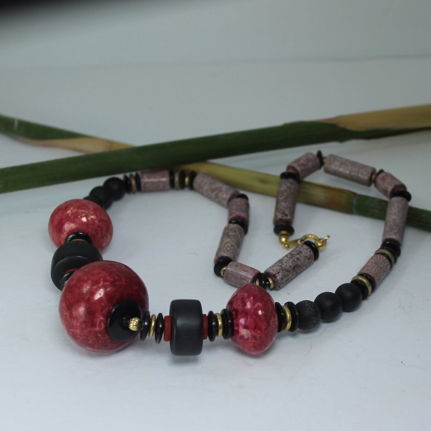 Statement Necklace Outstanding Colors Mauve Raspberry Black Beads Large Round Tube Japan table view necklace