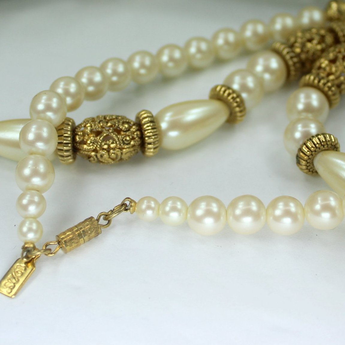 Classic But Bettter 1928 Brand Necklace Goldtone Filigree Pearls 24" closeup view filigree