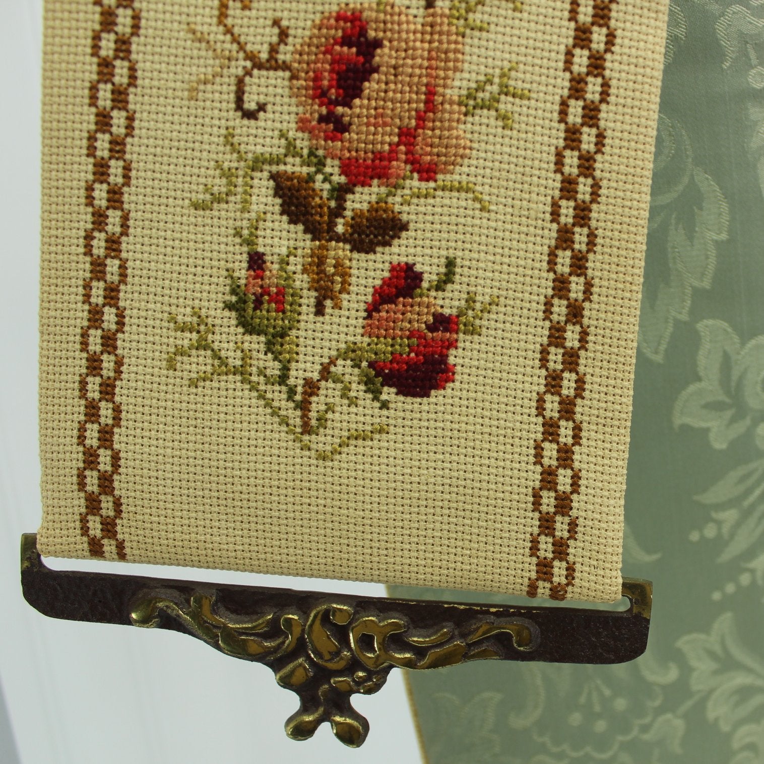Exquisiely Hand Crafted Bell Pull Cross Stitch Roses Salmon Sienna Brown Moss Brass Hdwe closeup floral design and metal finding