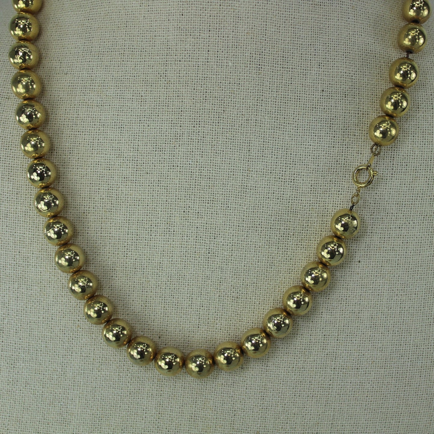 Chain Strung Metal Bead Necklace Bright Gold Tone Vintage 22" 10MM closeup beads and closure