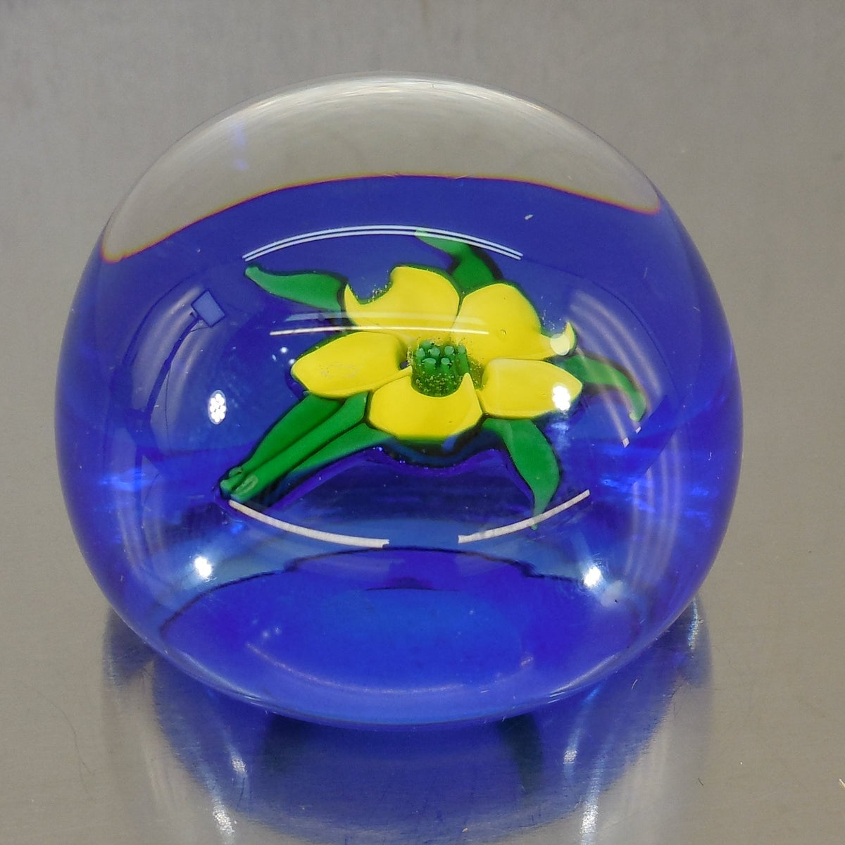 John Deacons Jay Glass 1970's Glass Paperweight Yellow Flower On Blue