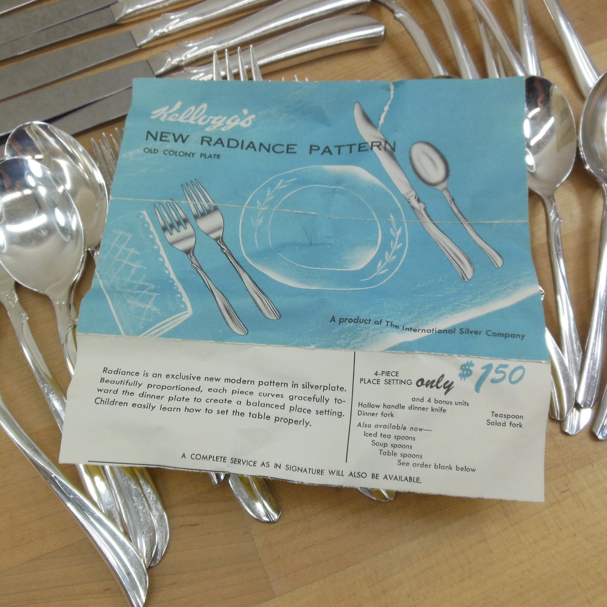 International Silver Kellogg's 1958 New Radiance Silverware - Service for 6 paperwork