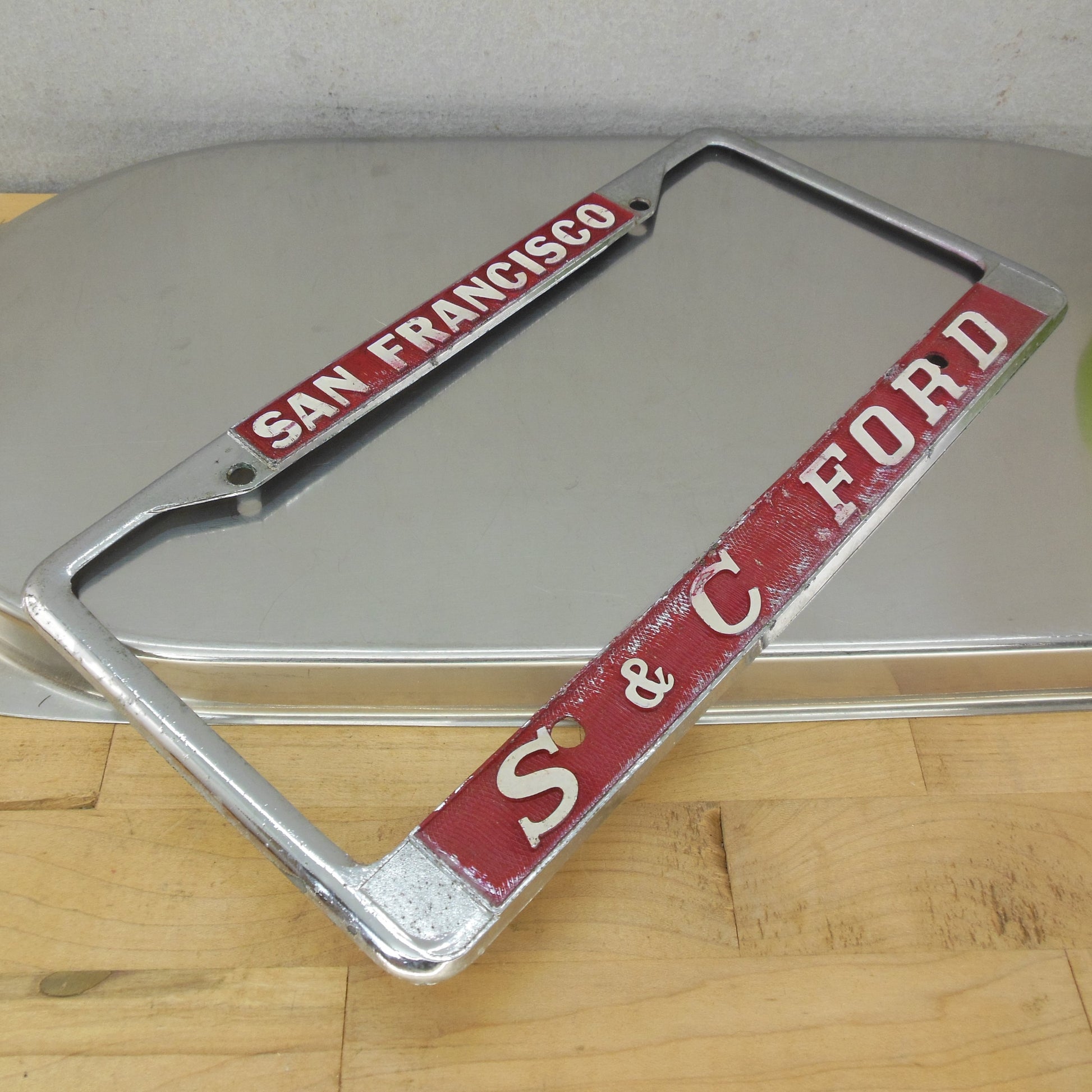 S&C Ford San Francisco CA Metal Red Dealer License Plate Frame Vintage
