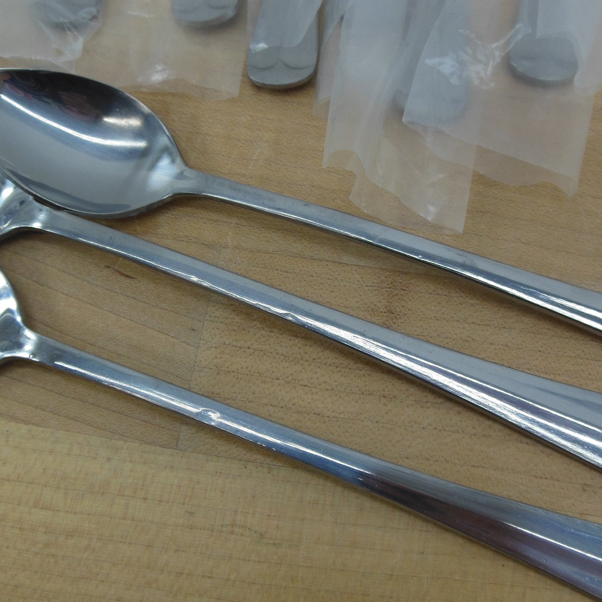 International Korea Cape Cod Stainless Flatware NIP Seconds - 12 Iced Tea Spoons New with defects