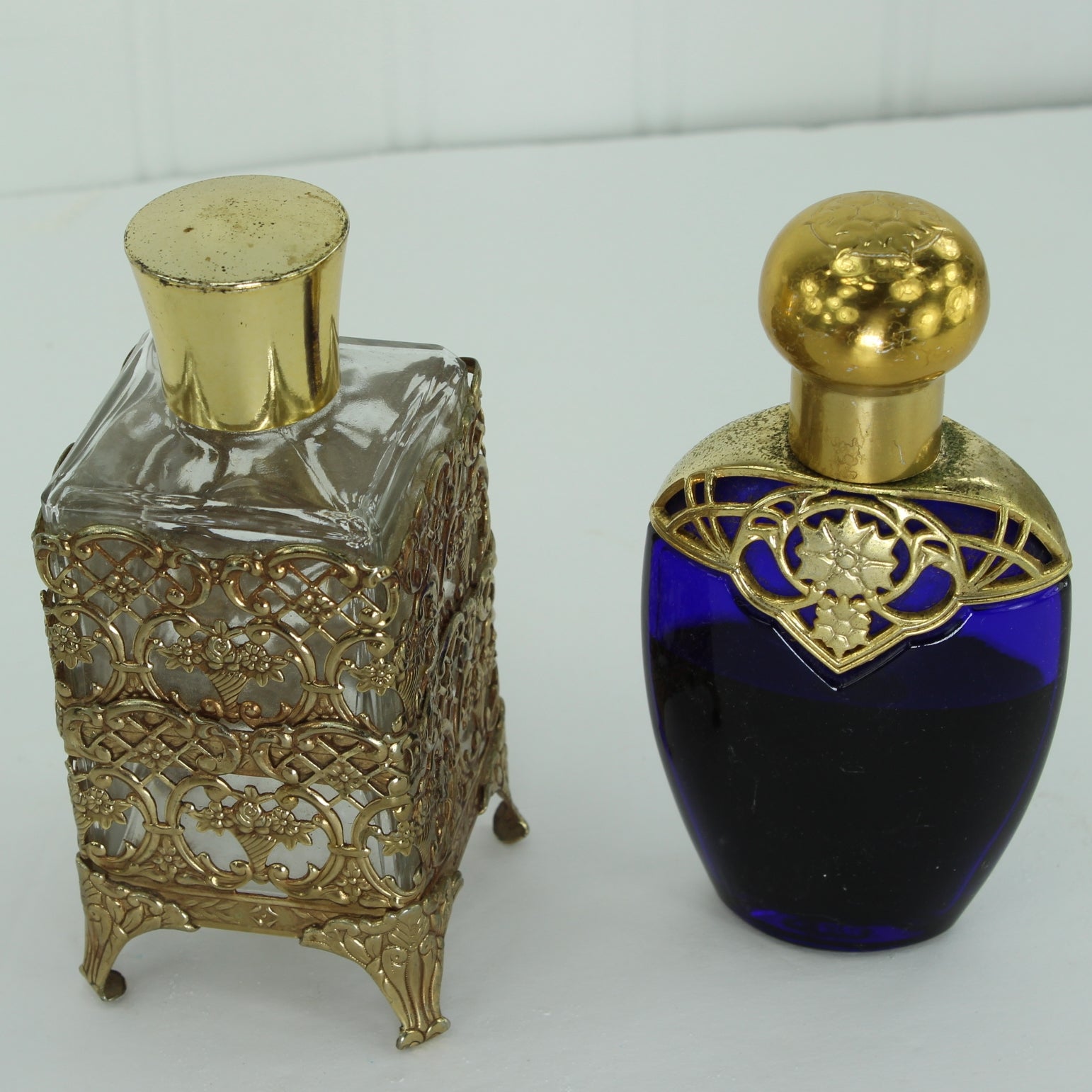 Avon Mesmerize Cobalt Bottle & Rococo Vanity Bottle