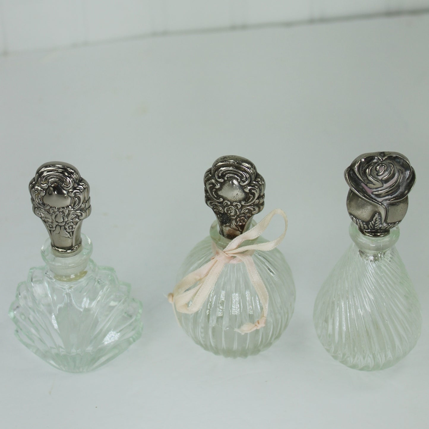 Three Vintage Vanity Scent Bottles Silver Dauber Roses Floral Tops silver quality unmarked