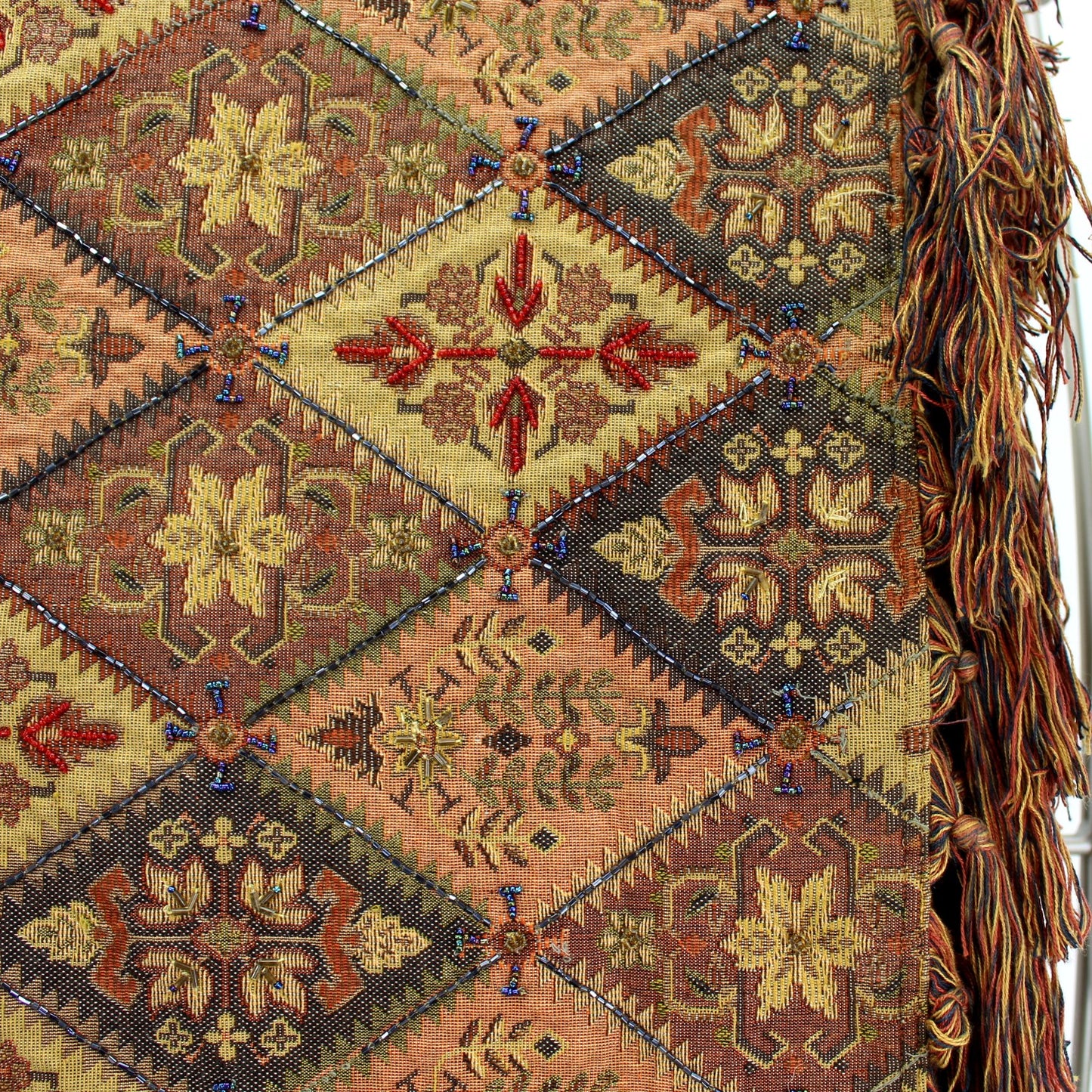 Pier One Fringed Beaded Tapestry Bed Throw Table Runner Decor Shawl Gold Brown Tan closeup of fabric beading