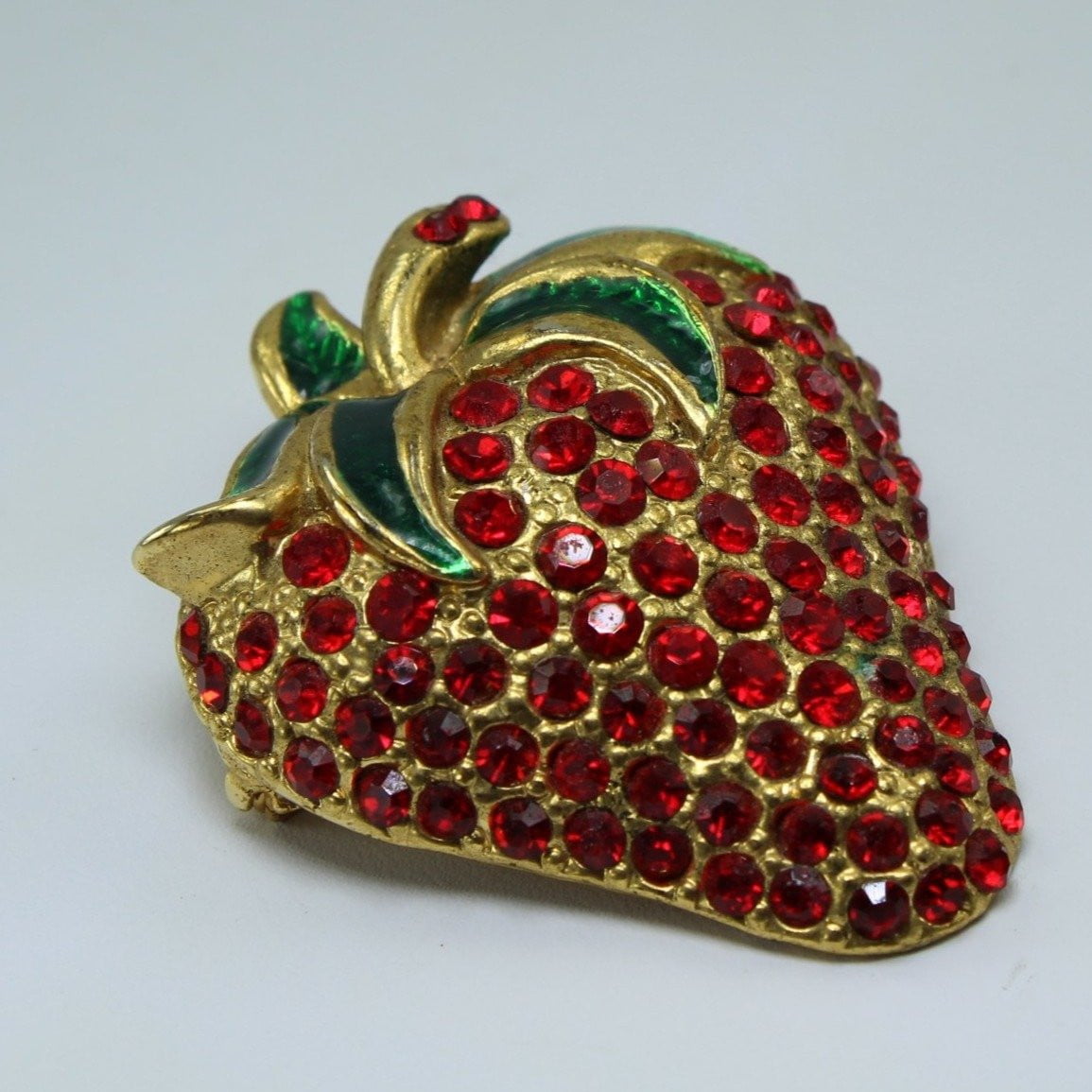 Unmarked Crystal Strawberry Pin Brooch - Red Crystals Green Enamel Leaves