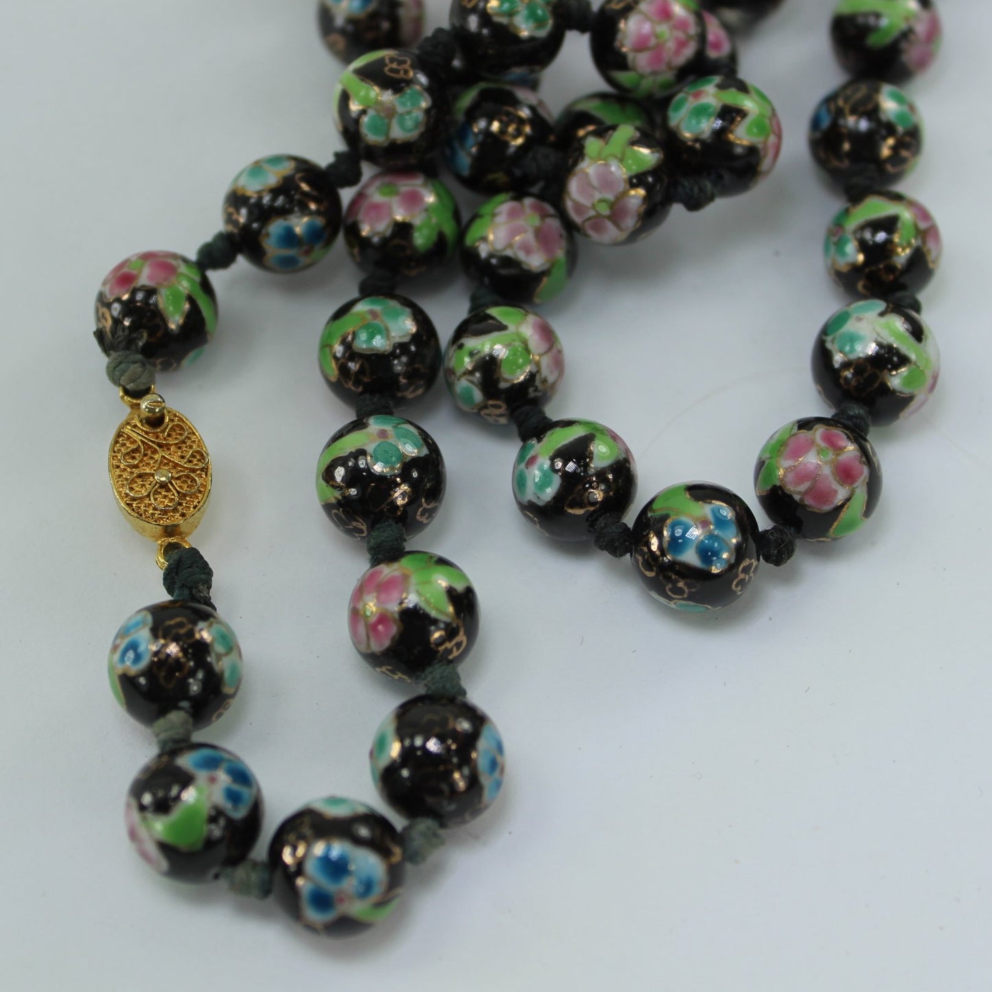 Older Cloisonne Hand Knotted Necklace 42 Beads 11mm Black Pink Blue very nice closure