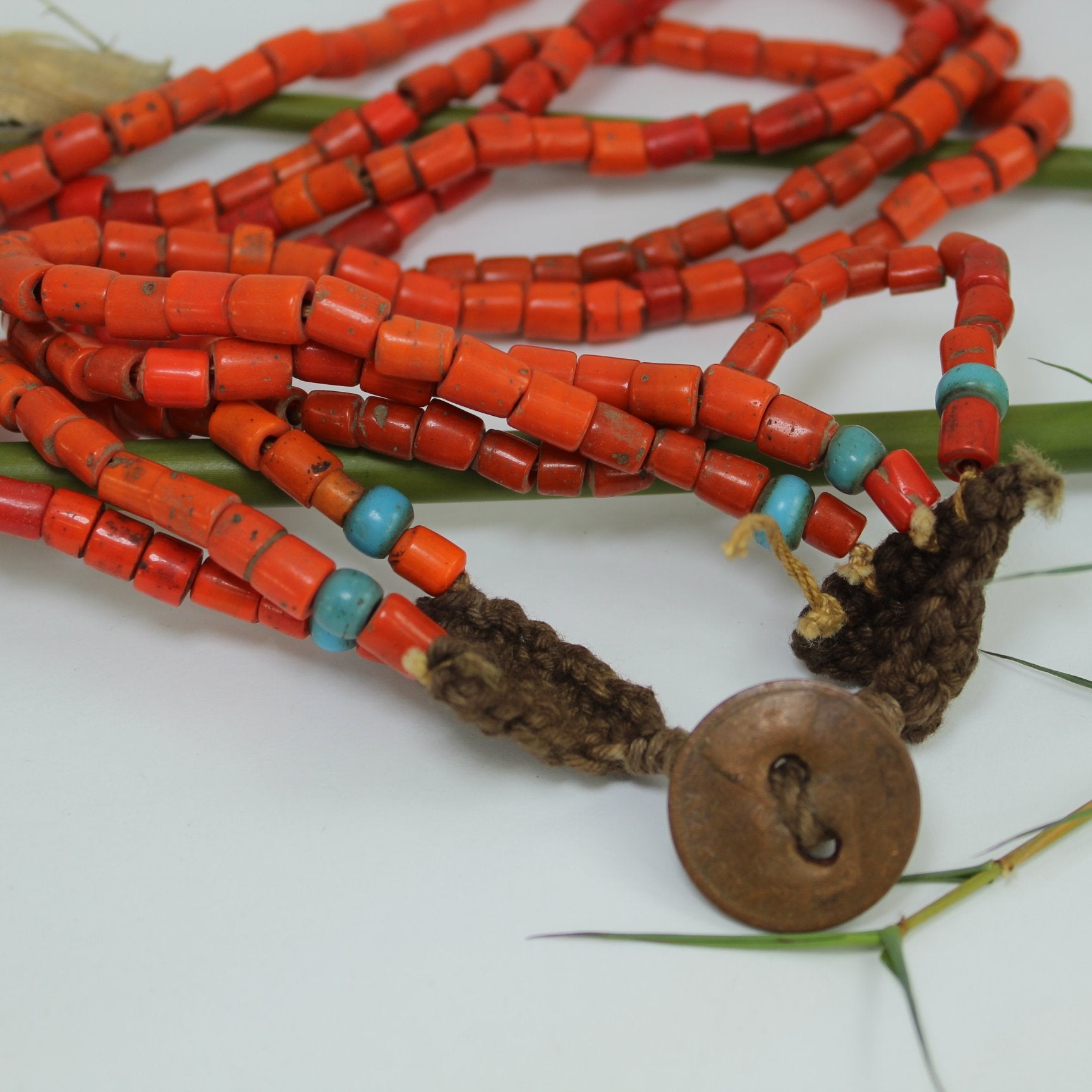 African Necklace Coral Beads Blue Glass Beads Old Coin Closure closeup of closusre