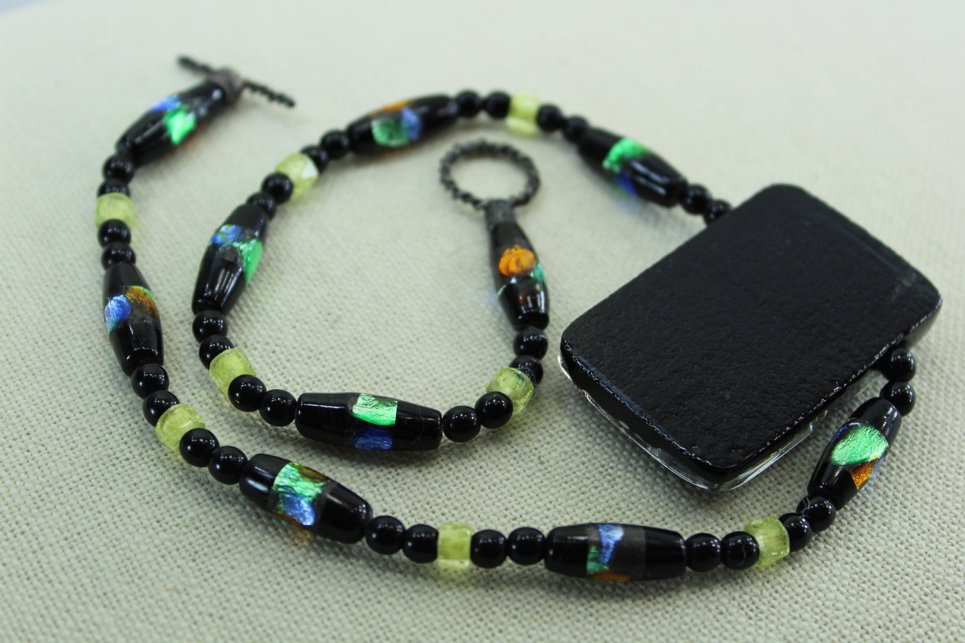Artisan Dichoric Glass Necklace Black with Vibrant Colors blue