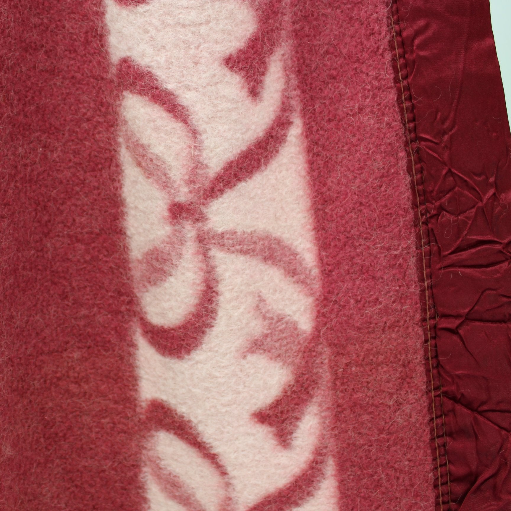 Unusual Pair Blankets Raspberry White Ribbon Design Borders Reversible closeup fabri and border