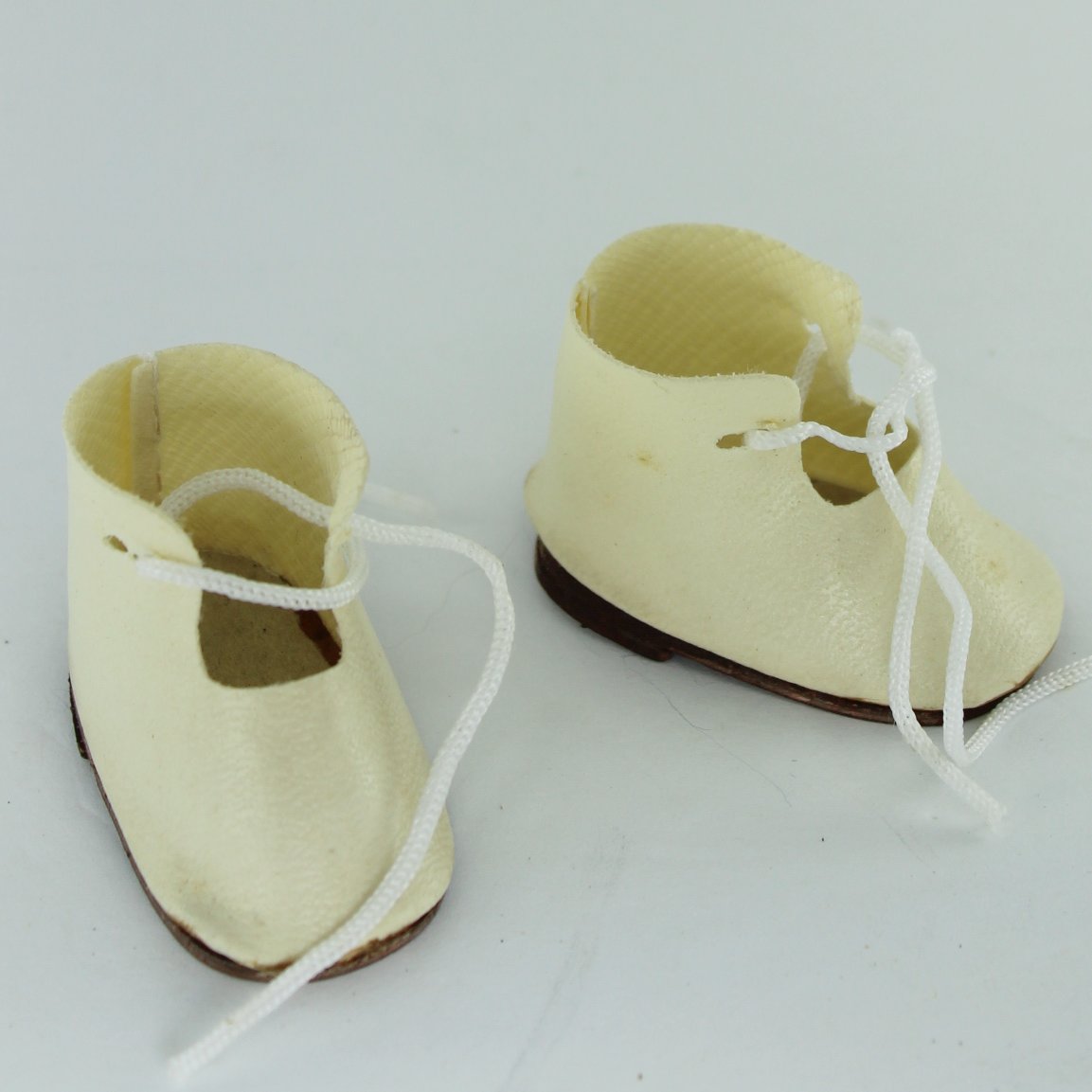 Collection Doll Shoes Stockings Antique Black Vici Kid Foerderer Philadelphia  White Leather Tie mid century doll baby shoes