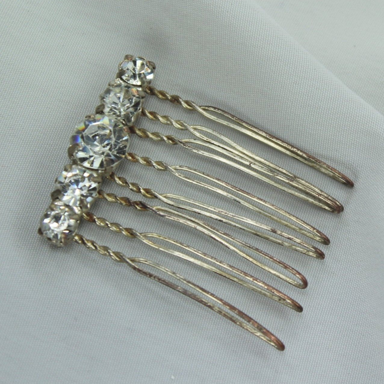Neat Vintage Antique Hair Pin Decoration. Metal hair pin like base with large shiny Rhinestones. Metal shows vintage Stones great!  Fun piece.  jewelry