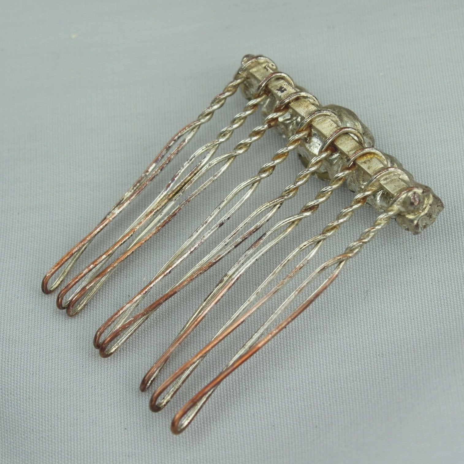 Neat Vintage Antique Hair Pin Decoration. Metal hair pin like base with large shiny Rhinestones. Metal shows vintage Stones great!  Fun piece.  Used