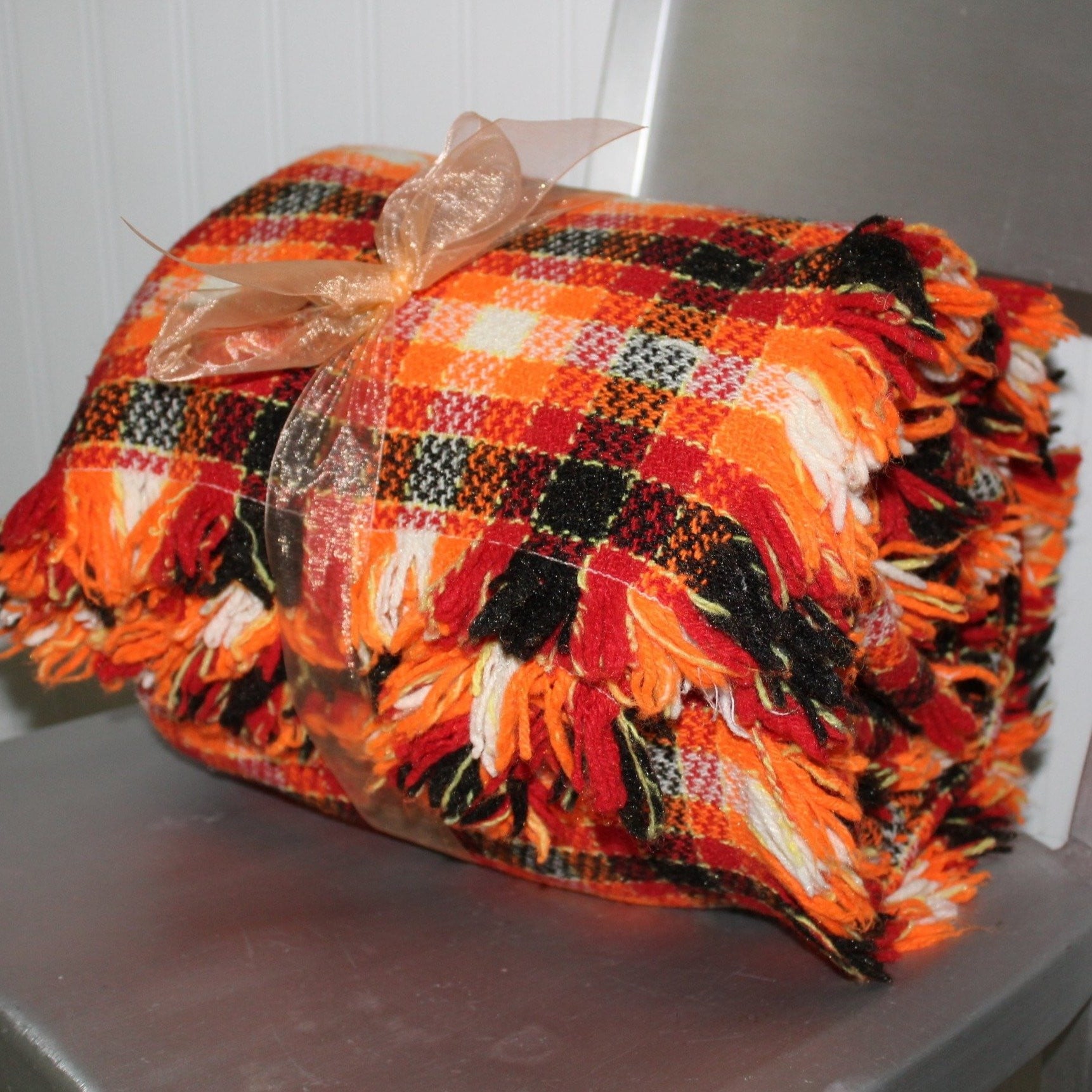 Orange and best sale black plaid blanket