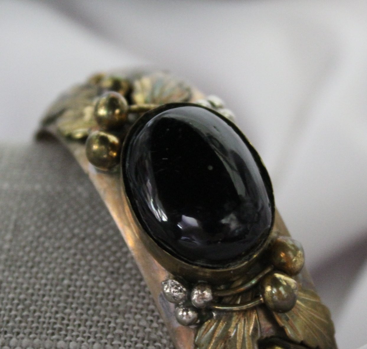 Ethnic Bracelet Multi Metal Large Black Stone Applied Leaves Berries interesting