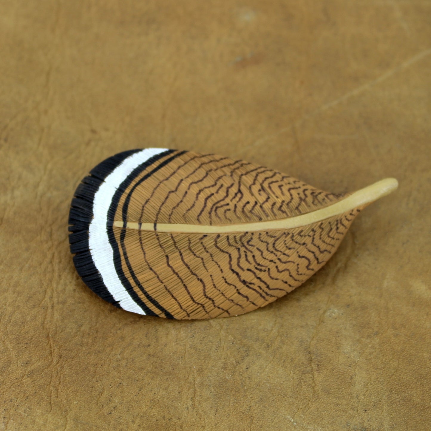 Wm Schermerhorn Wood Feather Pin Carved Painted Wood Duck Rochelle Ill & Okeechobee Fl Carver shown on leather