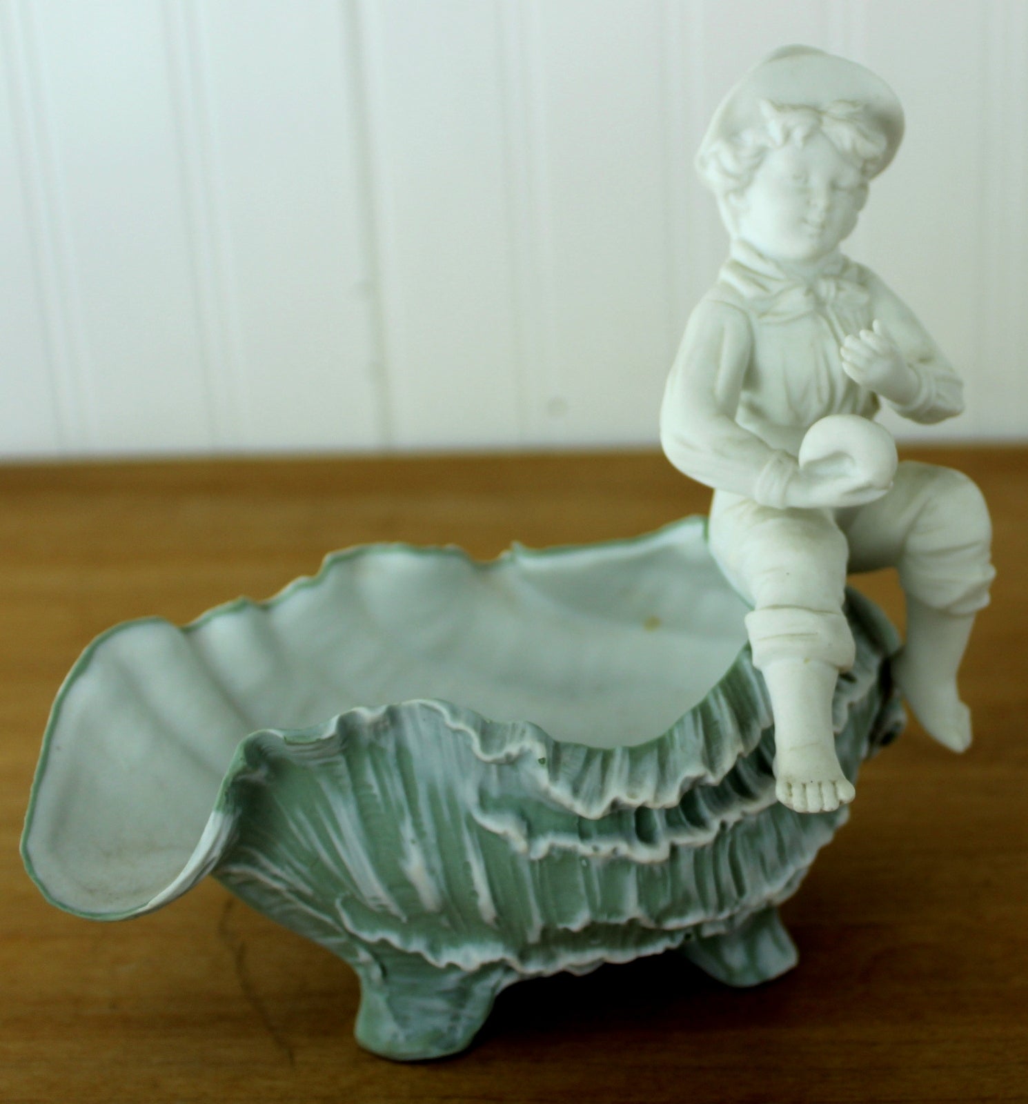 Bisque Victorian Boy on Shell Dish Vase - Exquisite green shell bowl