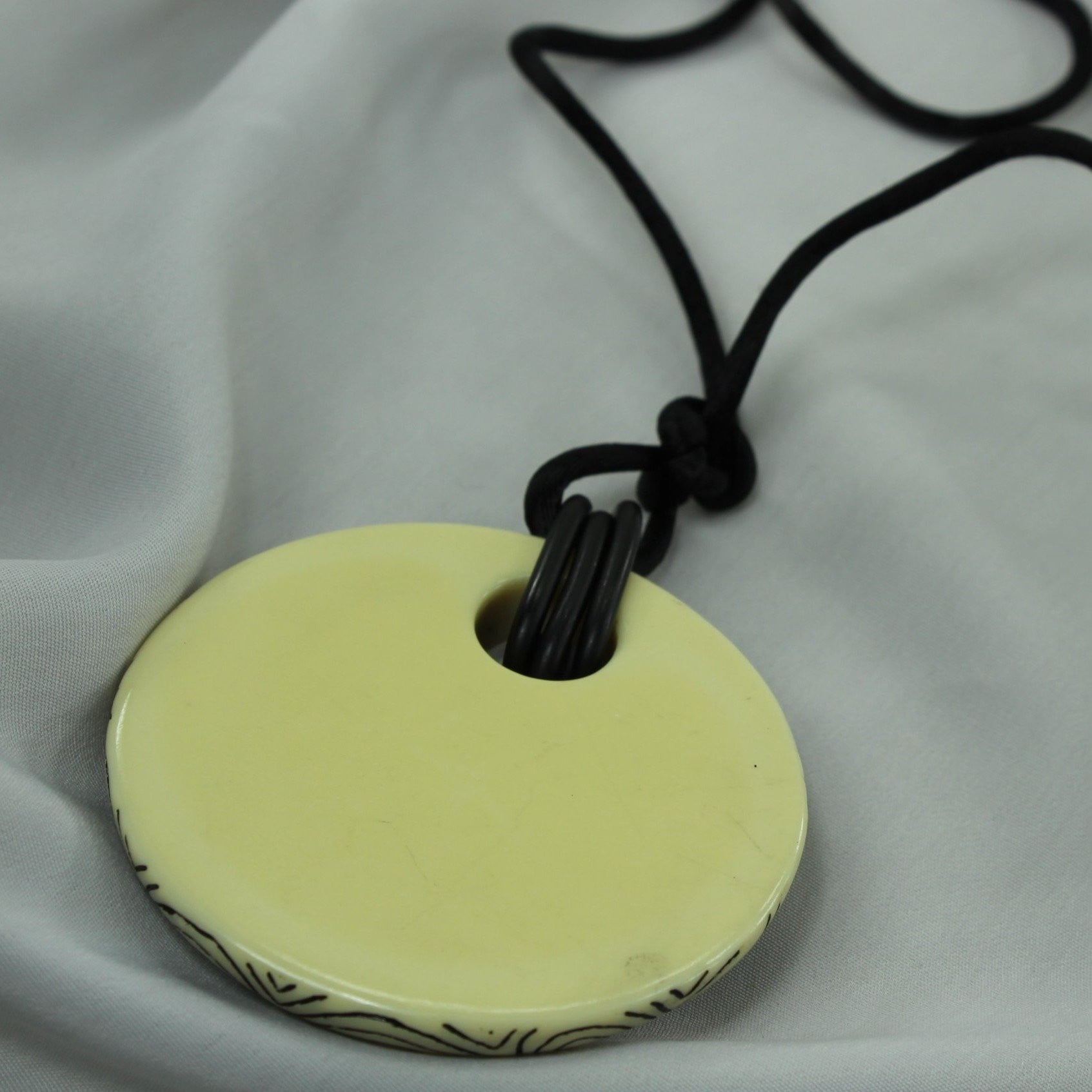 Artisan Etched Pendant Necklace Black and Cream collectible