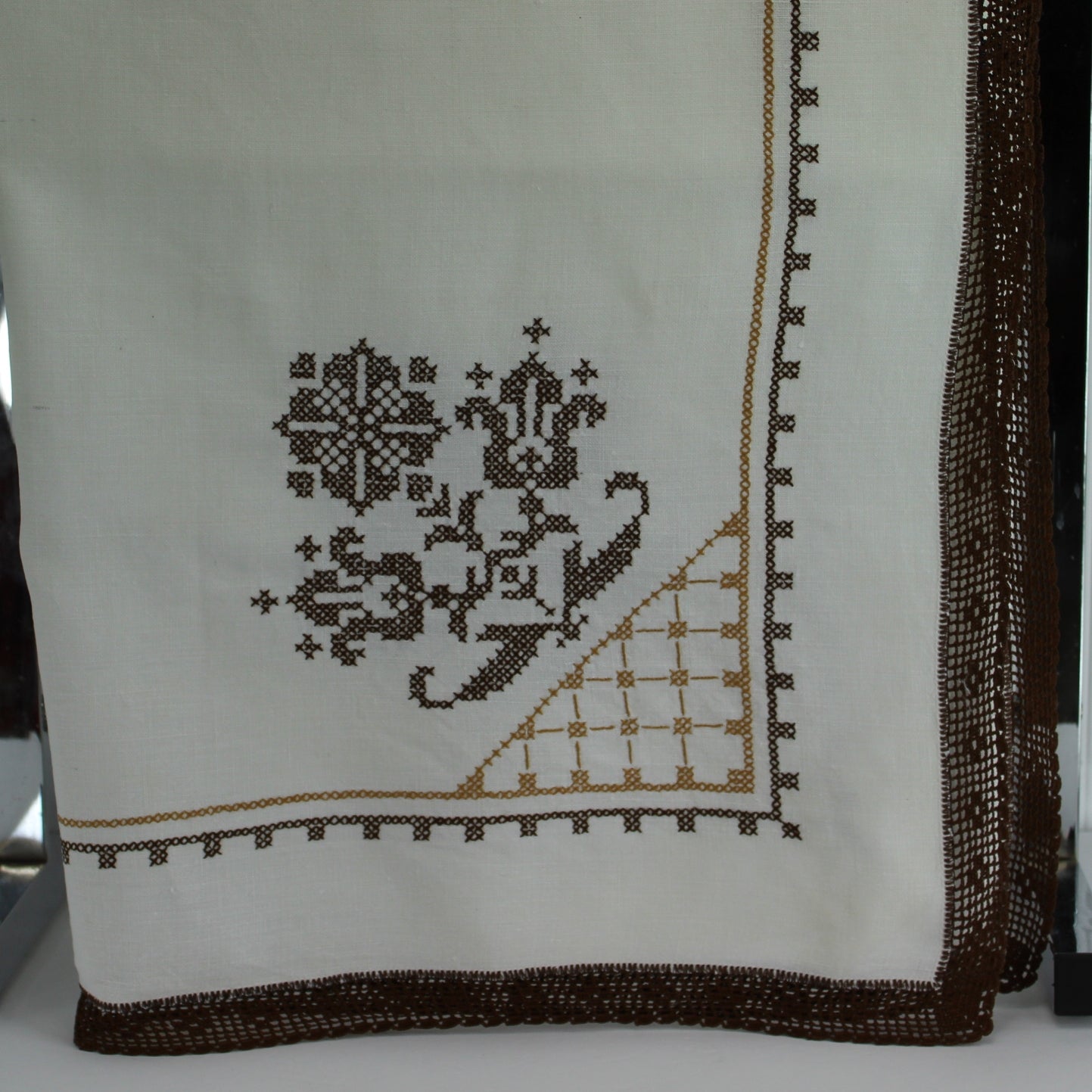 Brown Cross Stitch Embroidered Tablecloth Heavy White Linen Crochet Edges corner view of tablecloth