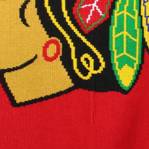 Chicago Blackhawks Jennick Knits Acrylic Sweater Knit Stadium Throw Blanket view of mark below logo