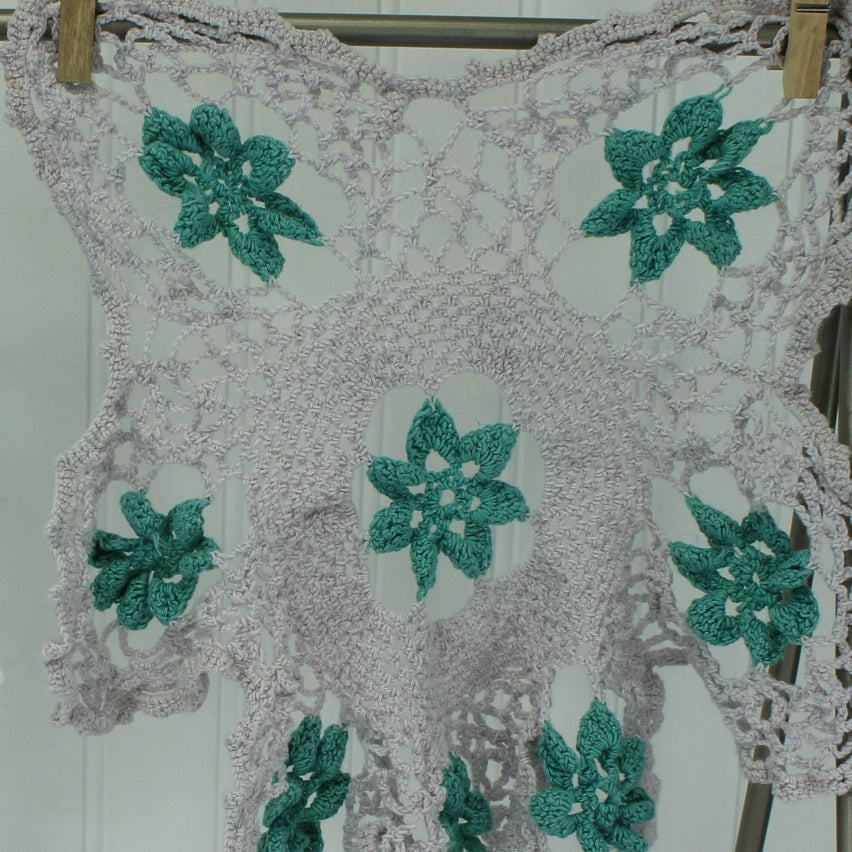 Pair Crochet Doilies  Raised Dimensional Flowers Grey Aqua and Blue on White closeup o f grey doily