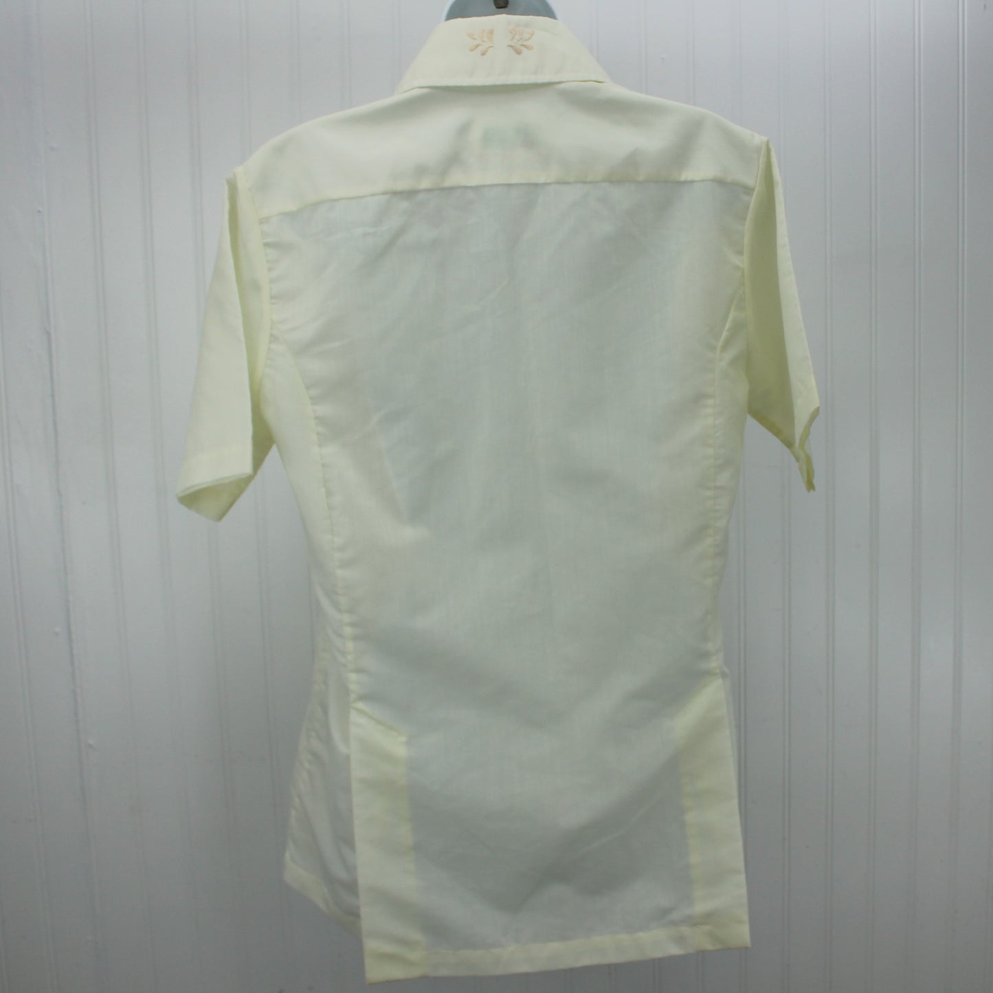 Older Filipino Baron Shirt Heavily Embroidered Pocket Front Placket Back All Gender back view of shirt with plackets at hem