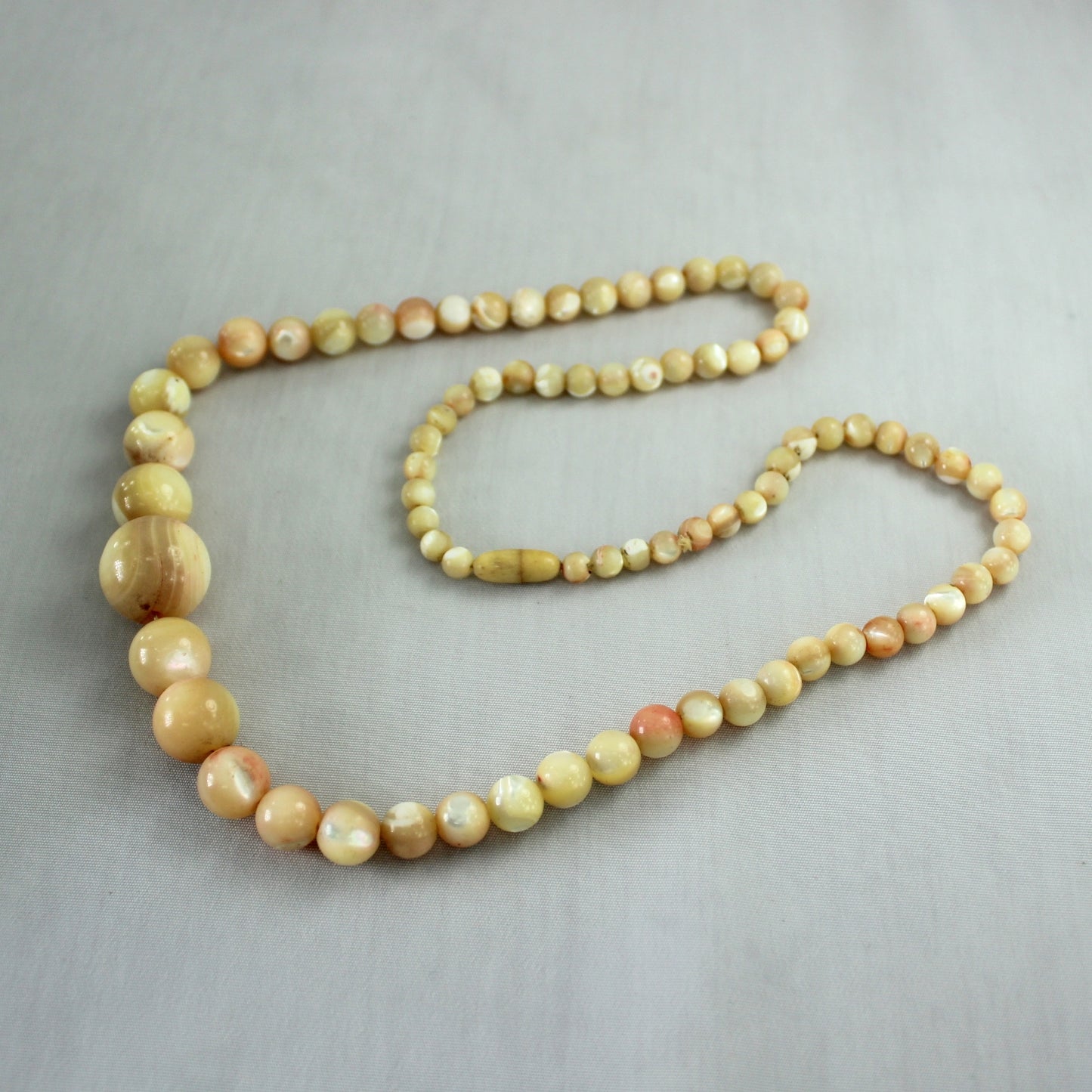 Older Mother of Pearl Necklace Cream Brown Graduated Size Round Beads Lovely nice feel on neck