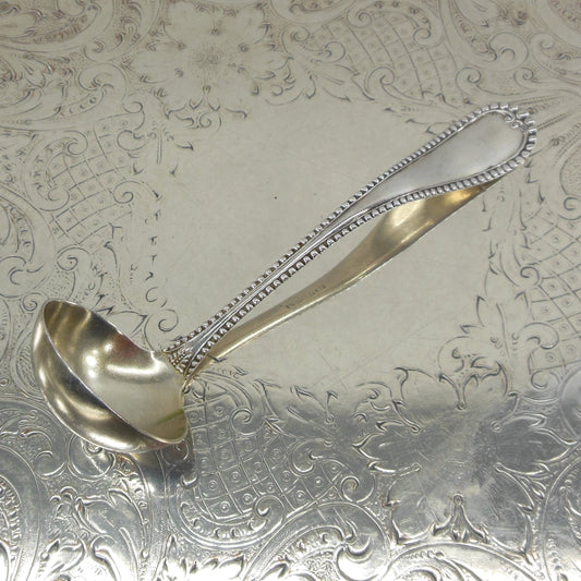 International Wm. Rogers Seville Beaded Silverplate Mayonnaise Ladle