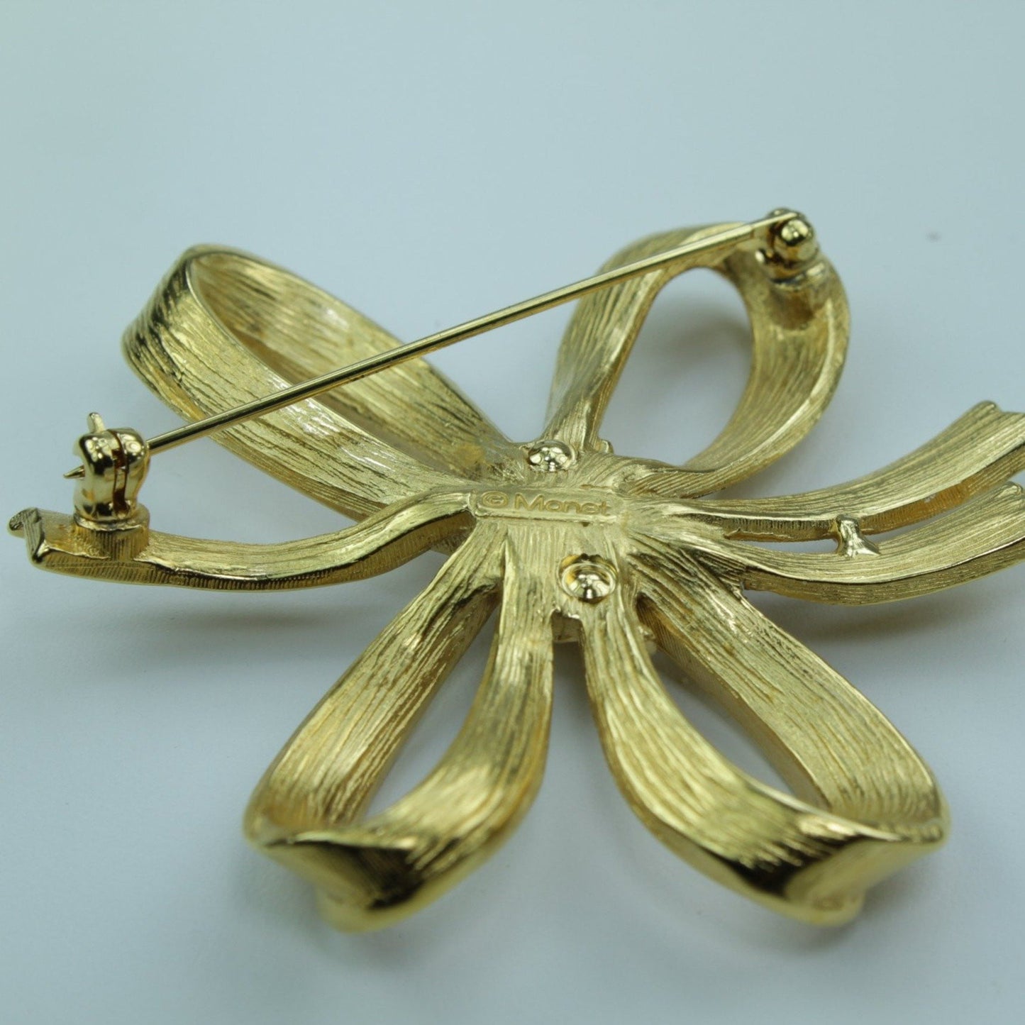 Vintage MONET Pin Gold Free Form Stylized Bow Mid Century excellent quality