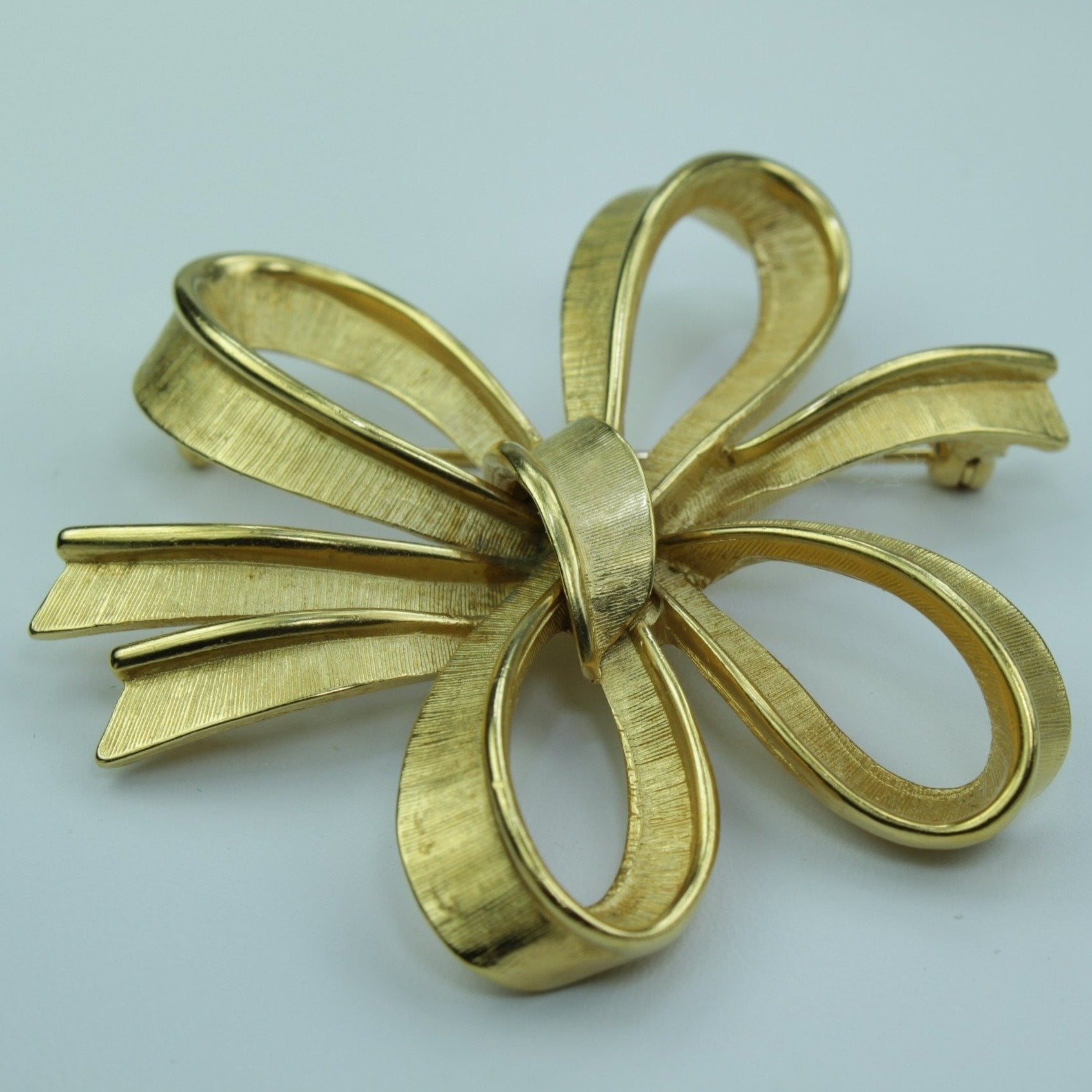 Vintage MONET Pin Gold Free Form Stylized Bow Mid Century
